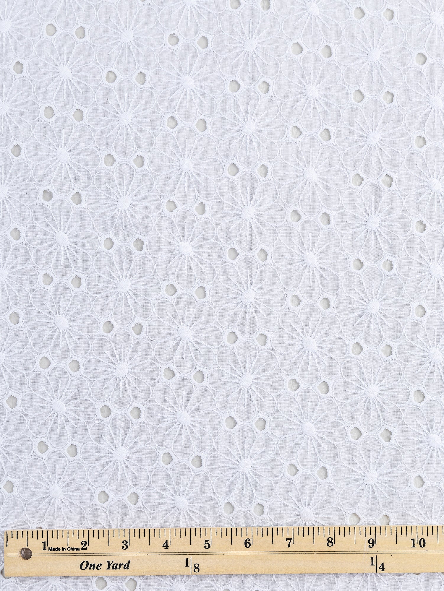 F-COT335-002-Daisy-Cotton-Eyelet-Deadstock-White-Core-Fabrics-ruler