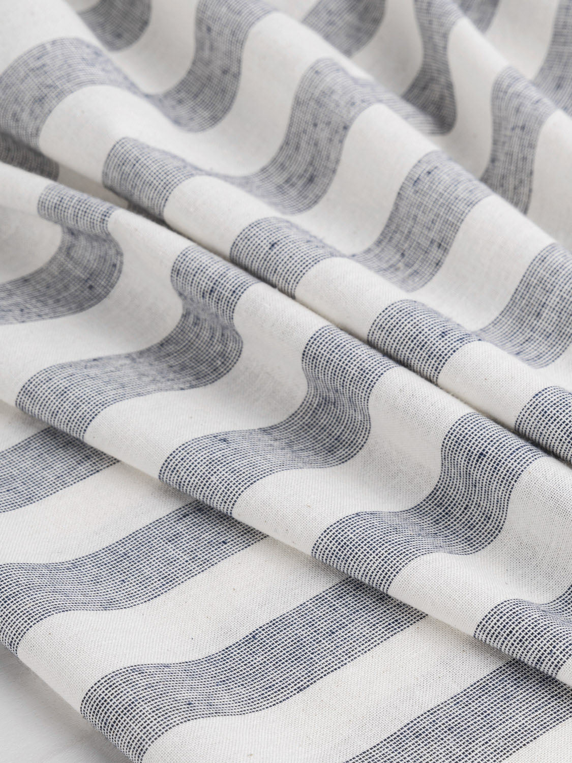 http://corefabricstore.com/cdn/shop/files/F-COT195-Wide-Stripe-Recycled-Cotton-Black-and-Cream-Core-Fabrics-scrunched.jpg?v=1694189107