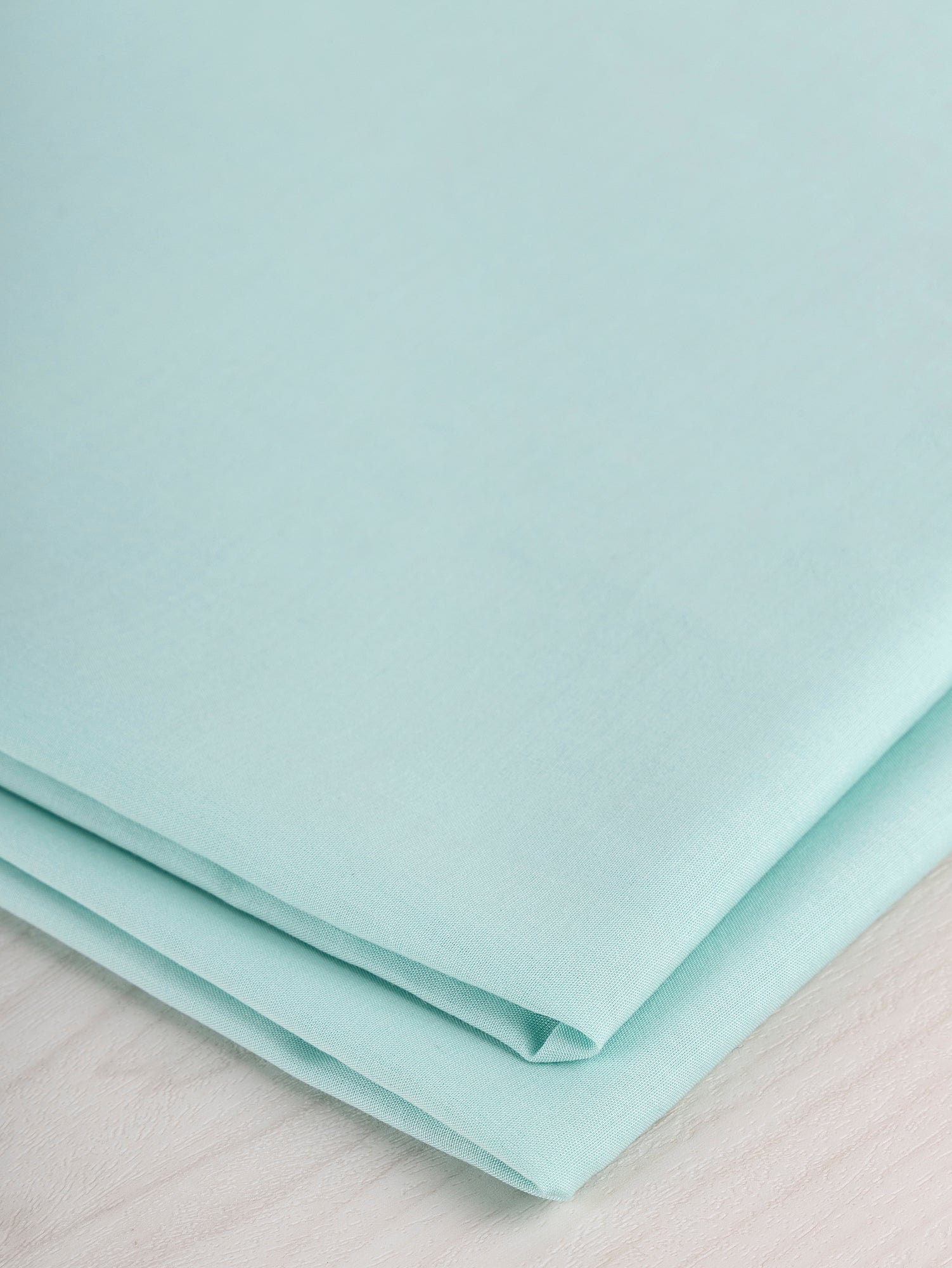 F-TEN016-003-Japanese-Tencel-Cotton-Voile-Mint-Core-Fabrics-fold.JPG