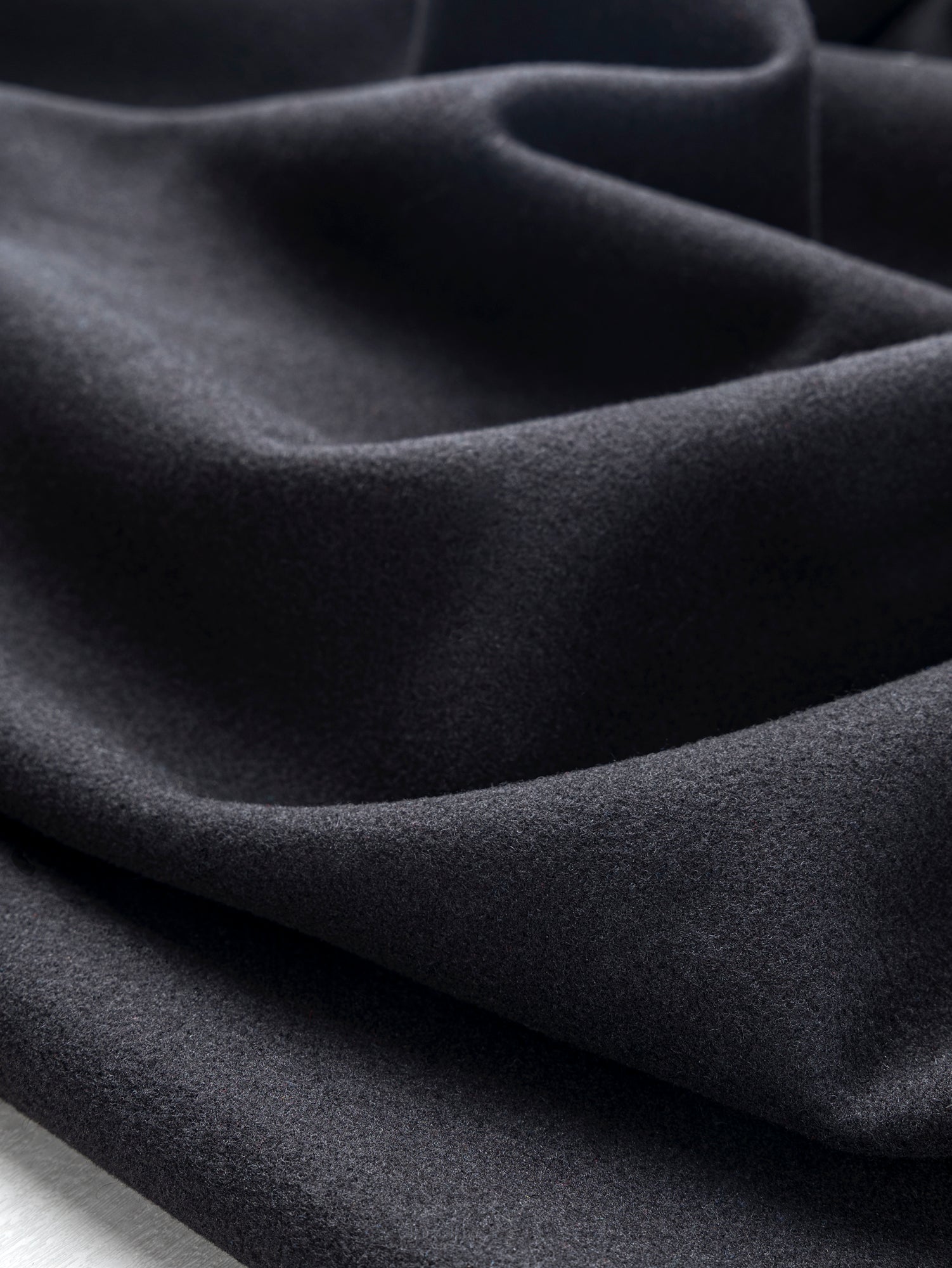 F-WOL135-Melton-Wool-Blend-Deadstock-Black-Core-Fabrics-scrunched.JPG