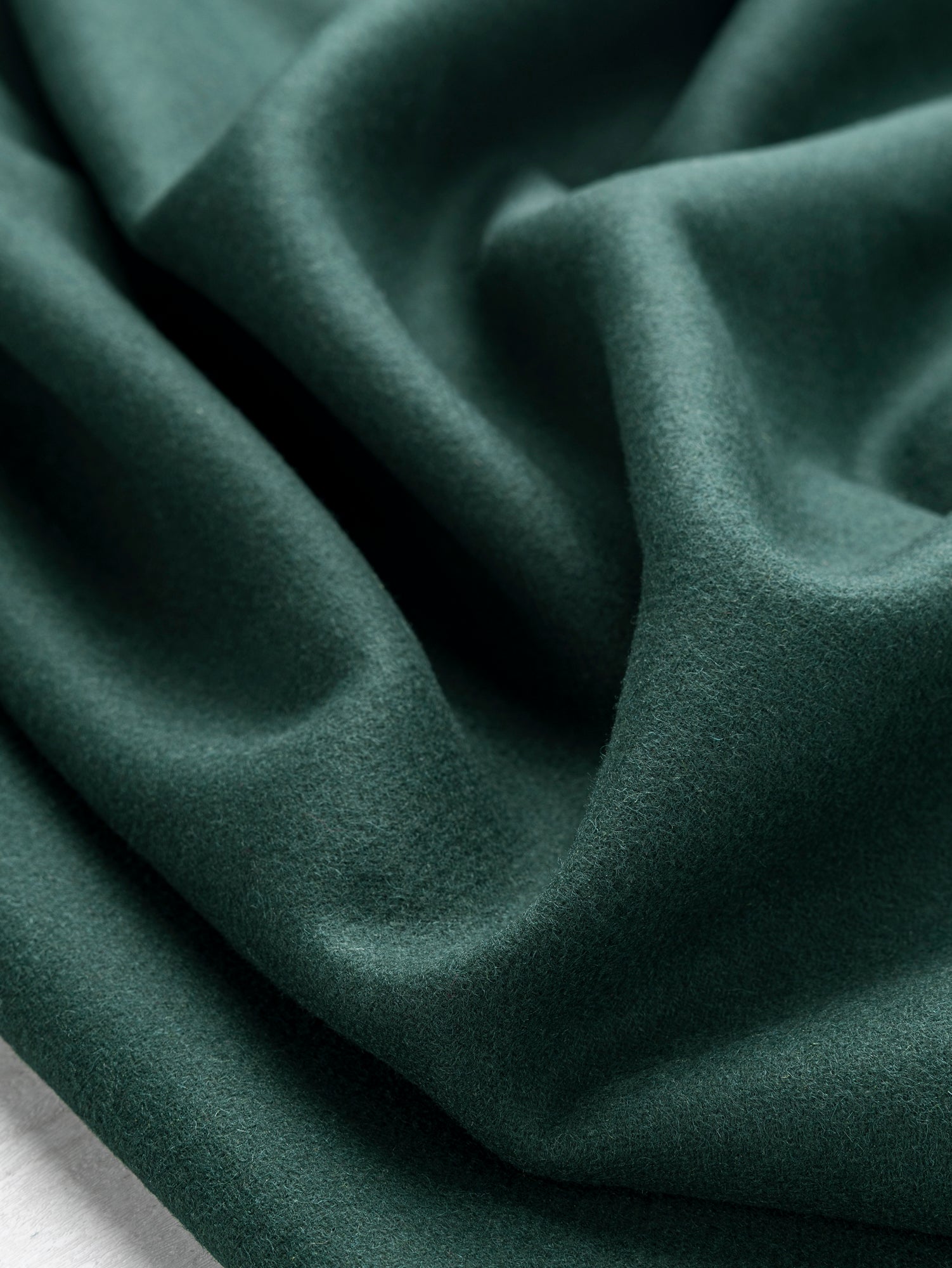 F-WOL134-Melton-Wool-Blend-Deadstock-Forest-Green-Core-Fabrics-scrunched.JPG