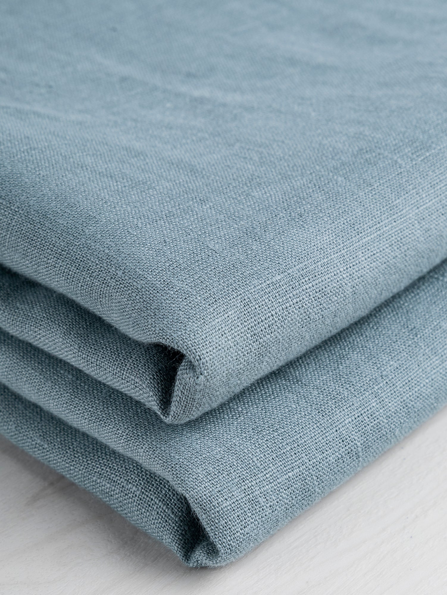 F-LIN020-042-Midweight-European-Linen-Light-Teal-Core-Fabrics-fold.JPG