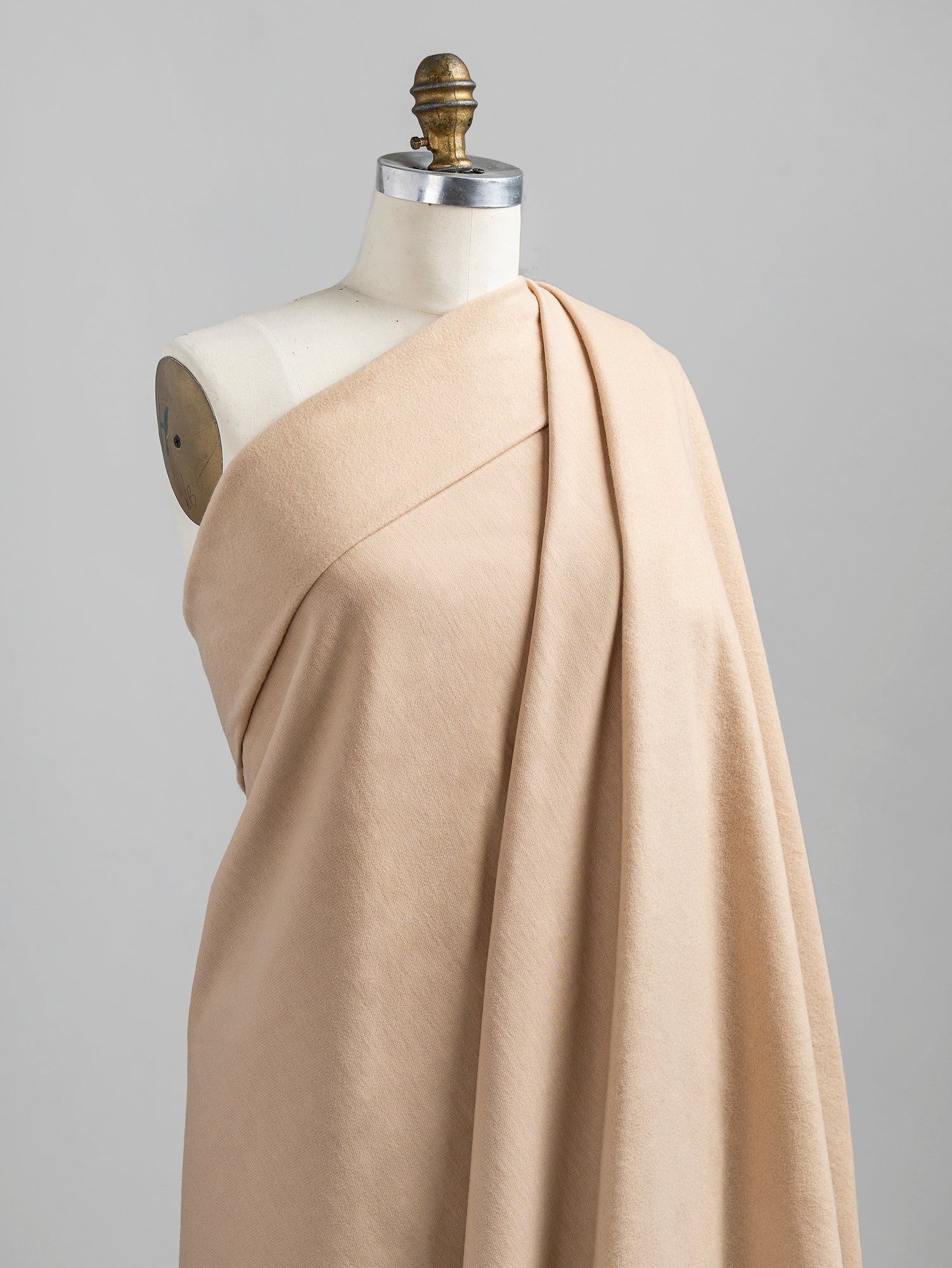 F-COT058-012-Organic-Cotton-Fleece-Beige-Core-Fabrics-draped.JPG