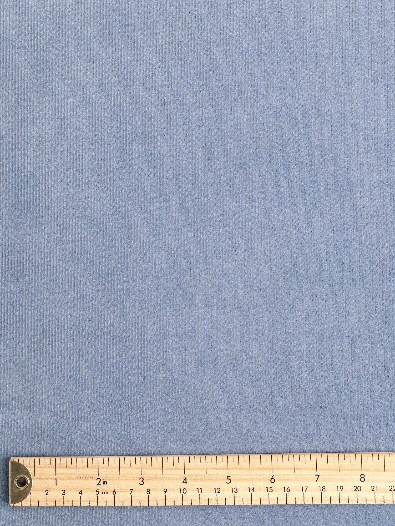 F-COT397-002-Organic-Cotton-Lycra-Slight-Stretch-14-Wale-Corduroy-Cornflower-Blue-Core-Fabrics-ruler.JPG