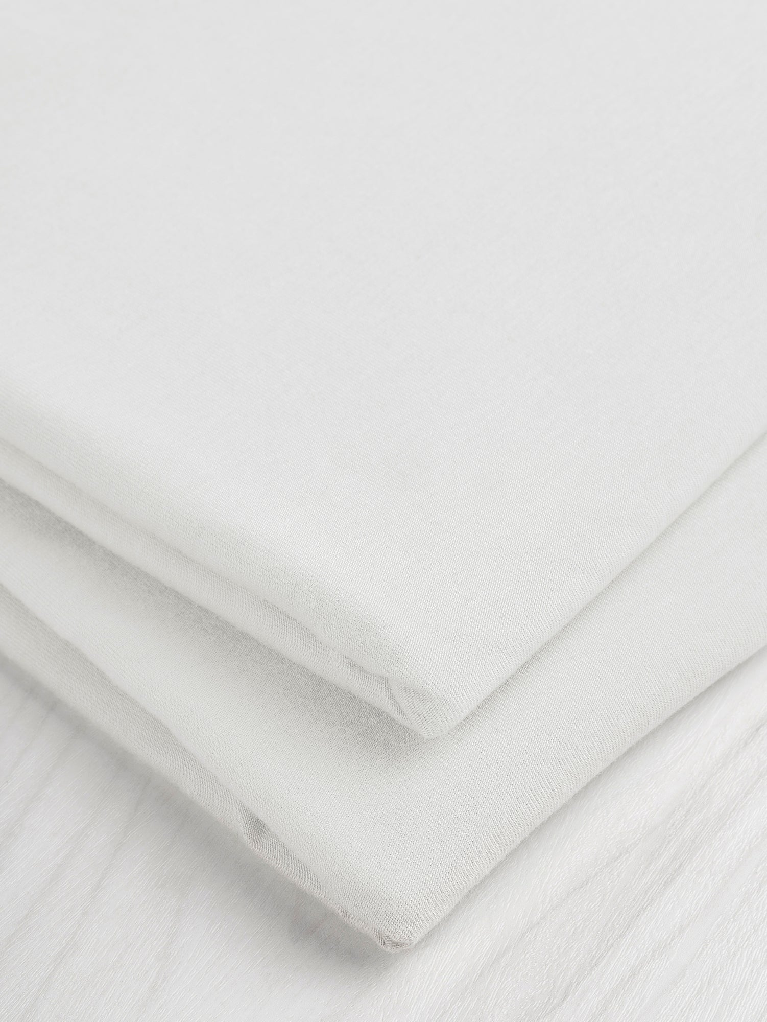 F-TEN008-023-Organic-Cotton-Tencel-Stretch-Knit-Jersey-Ivory-Core-Fabrics-fold