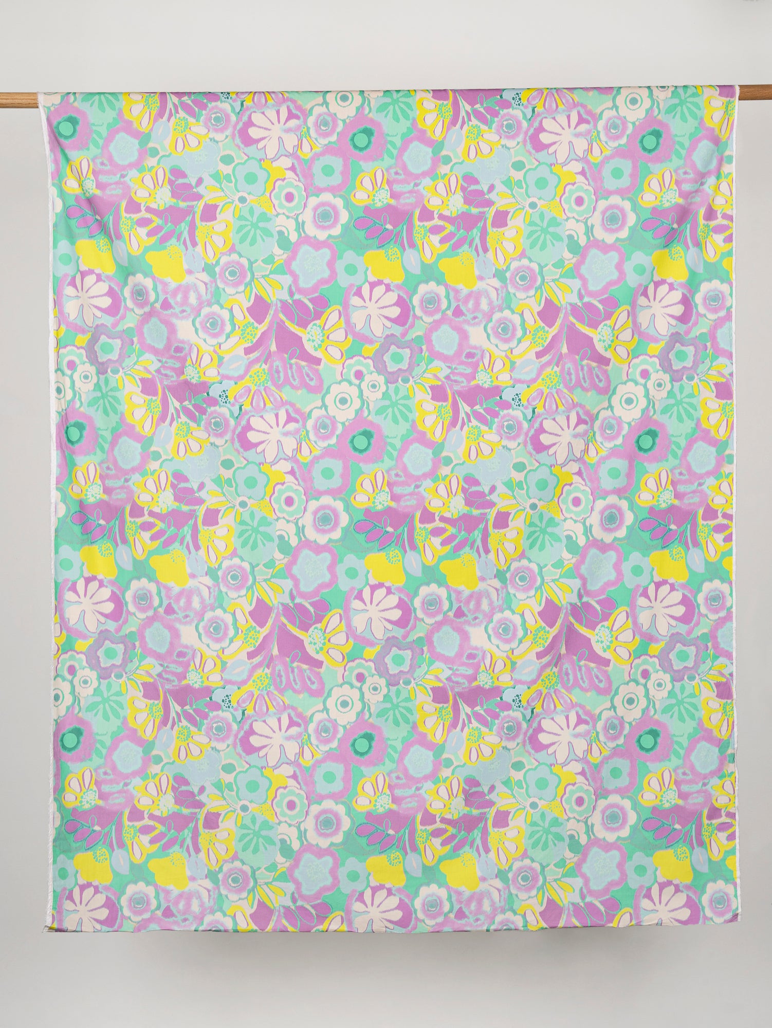 F-COT344-Pastel-Garden-Print-Cotton-Lawn-Cream-Lilac-Green-and-Yellow-Core-Fabrics-draped.JPG