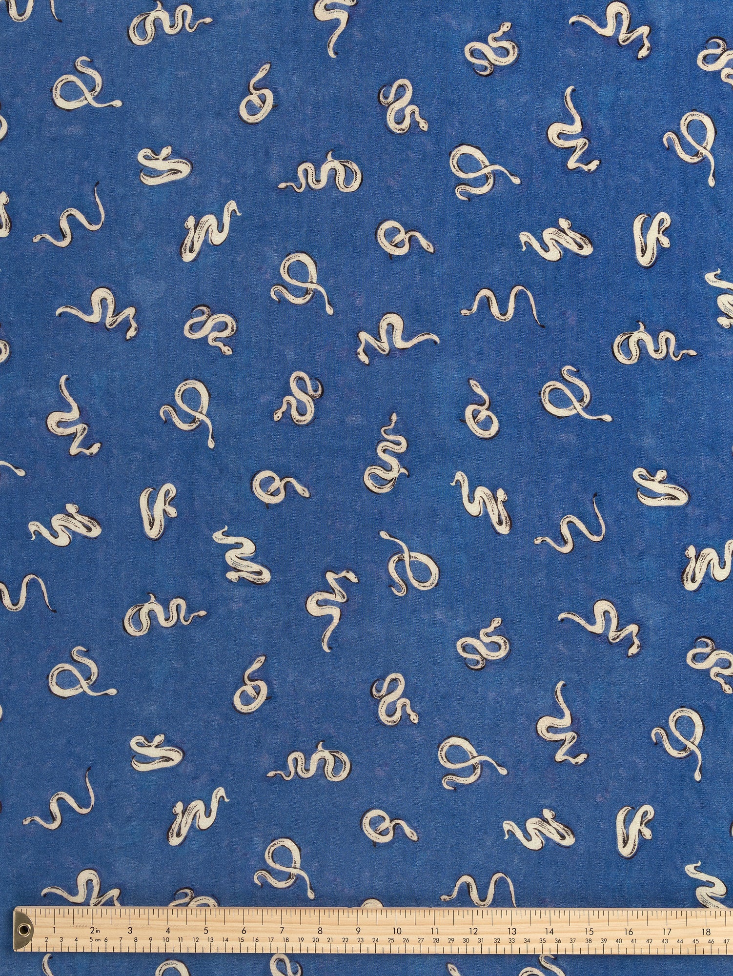 F-VIS273-Serpentine-Print-Viscose-Wool-Cerulean-Blue-Black-Cream-Fabrics-ruler.JPG