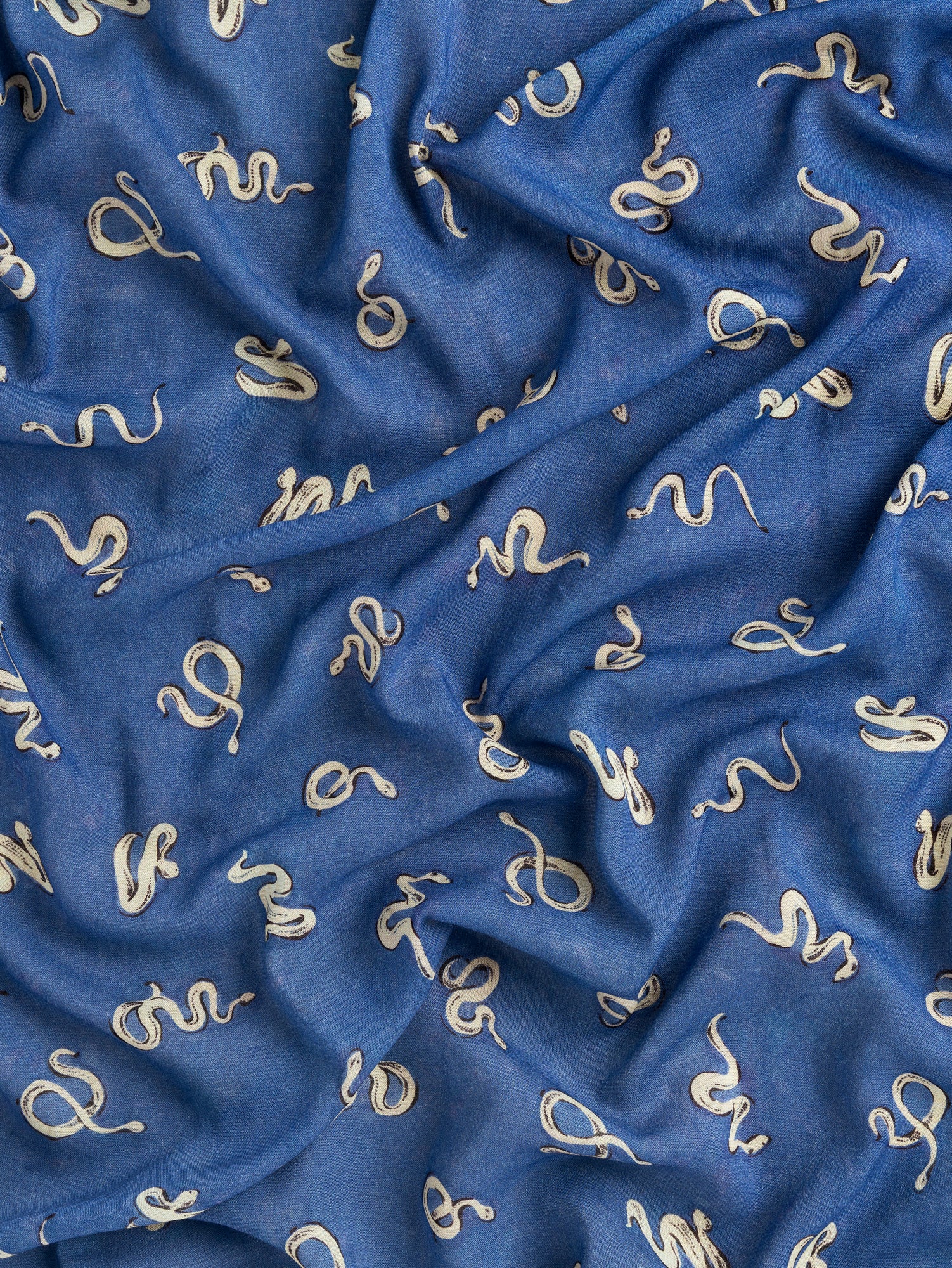 F-VIS273-Serpentine-Print-Viscose-Wool-Cerulean-Blue-Black-Cream-Fabrics-scrunched.JPG