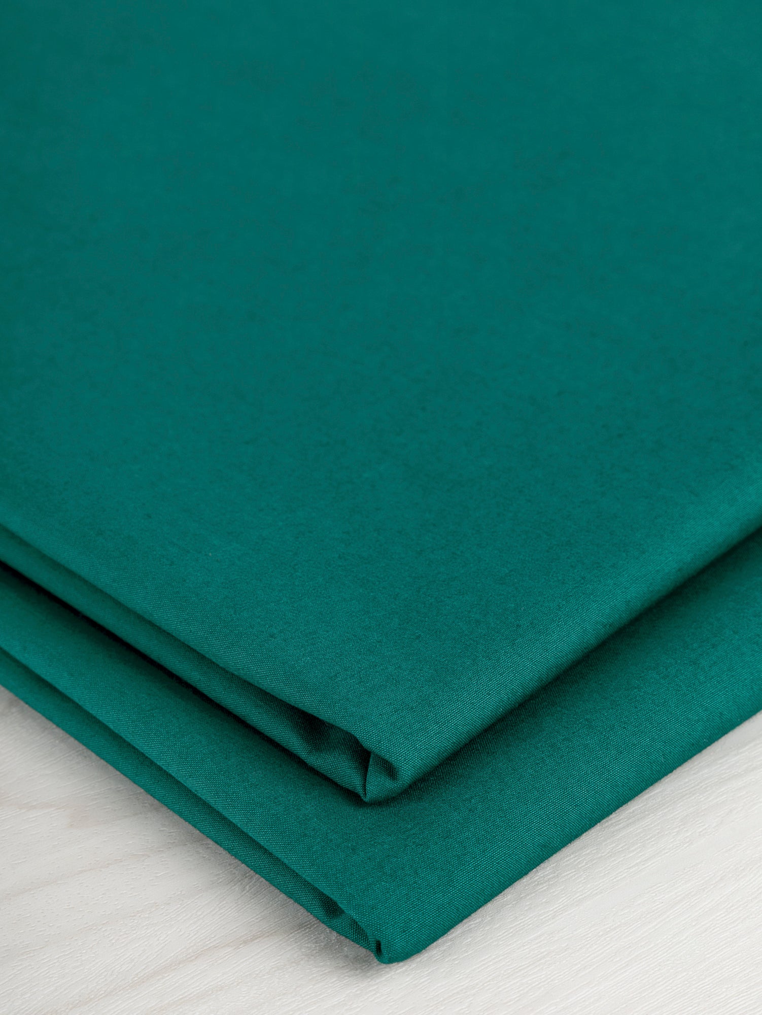 F-COT250-013-Signature-Crisp-Cotton-Poplin-Teal-Core-Fabrics-fold.JPG