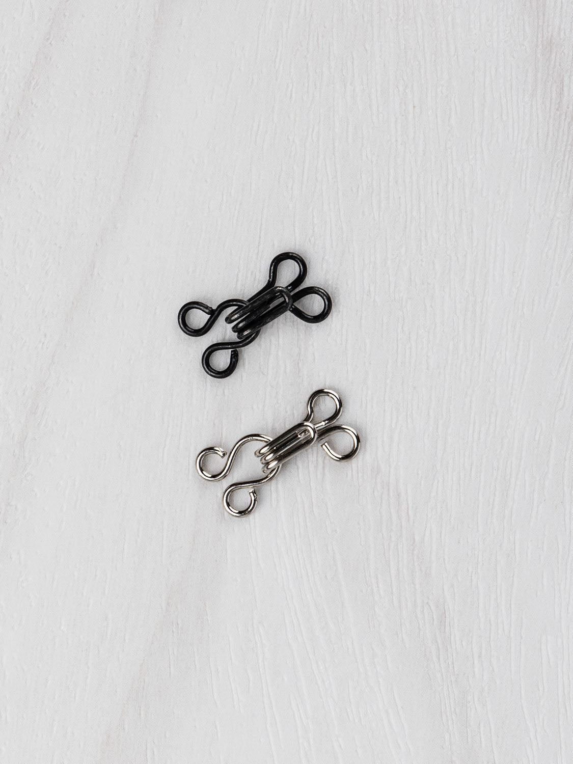 Size-2-Hook-and-eye-rainbow-silver-and-black | Core Fabrics