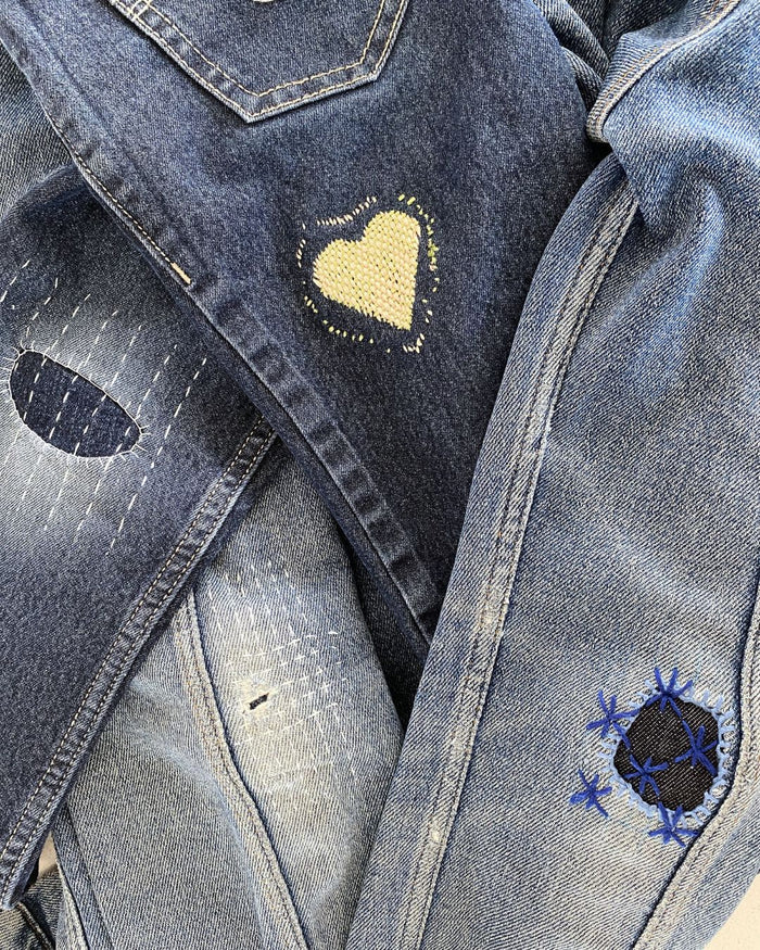 Repaired Clothes using visible mending techniques