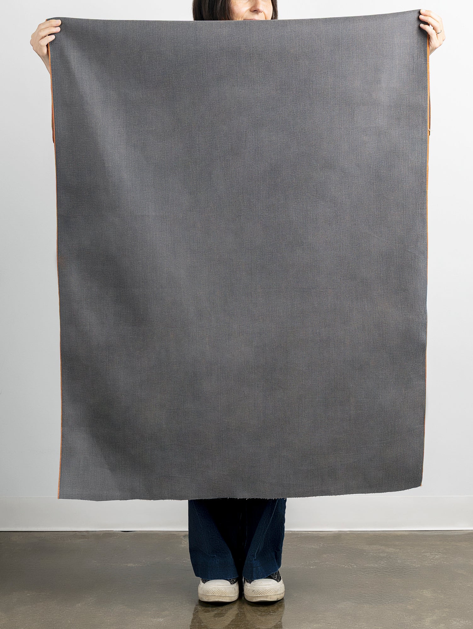 F-DEA089-10-9-oz-Slight-Stretch-Selvedge-Denim-Deadstock-Slate-Beige-Core-Fabrics-draped.JPG