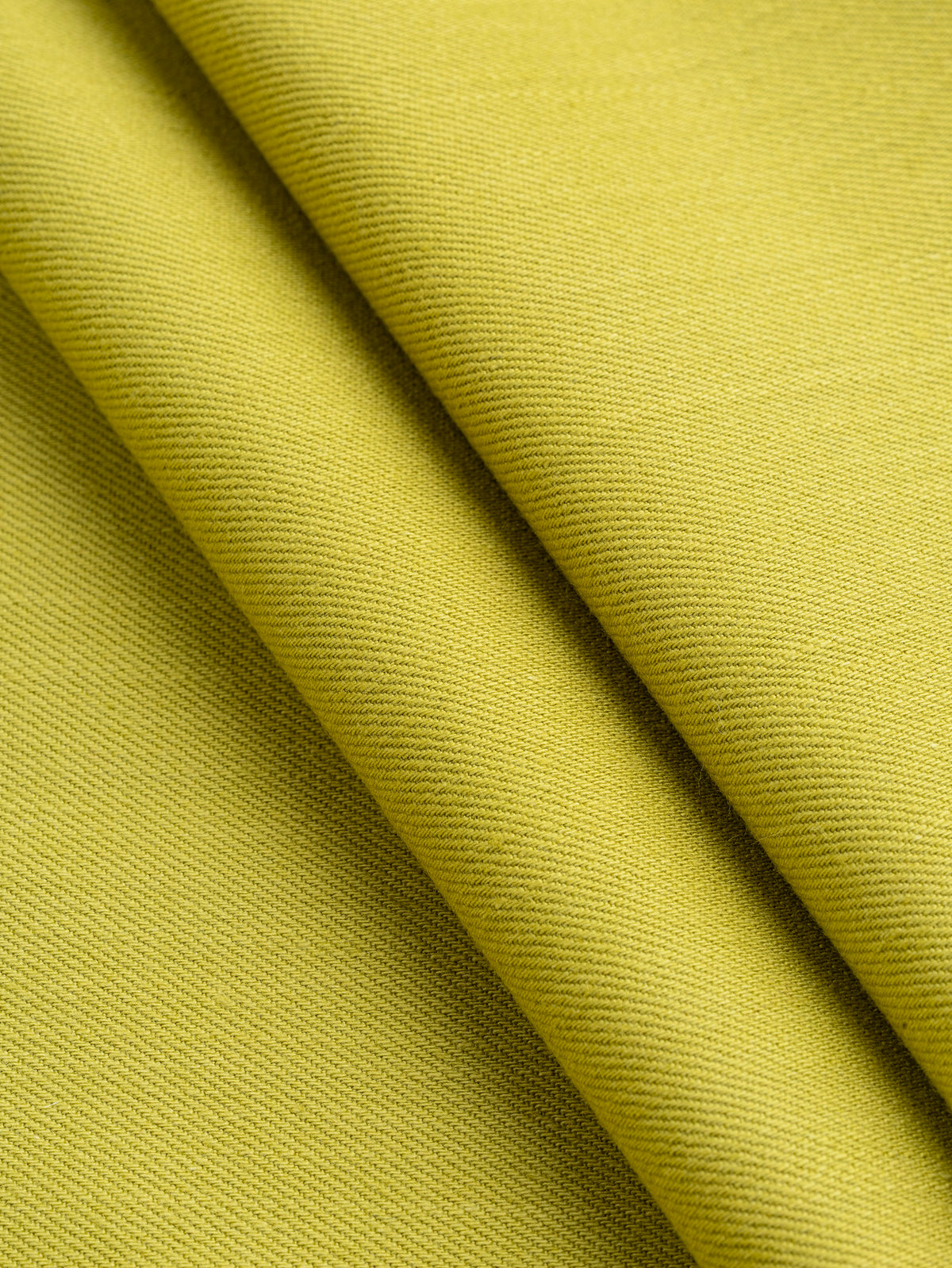 F-DEN022-013-10oz-Organic-Cotton-Stretch-Bull-Denim-Chartreuse-Core-Fabrics-fold.webp