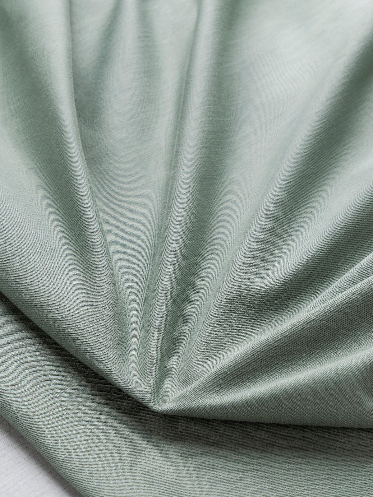 F-DEN022-010-10oz-Organic-Cotton-Stretch-Bull-Denim-Eucalyptus-Core-Fabrics-scrunched.webp