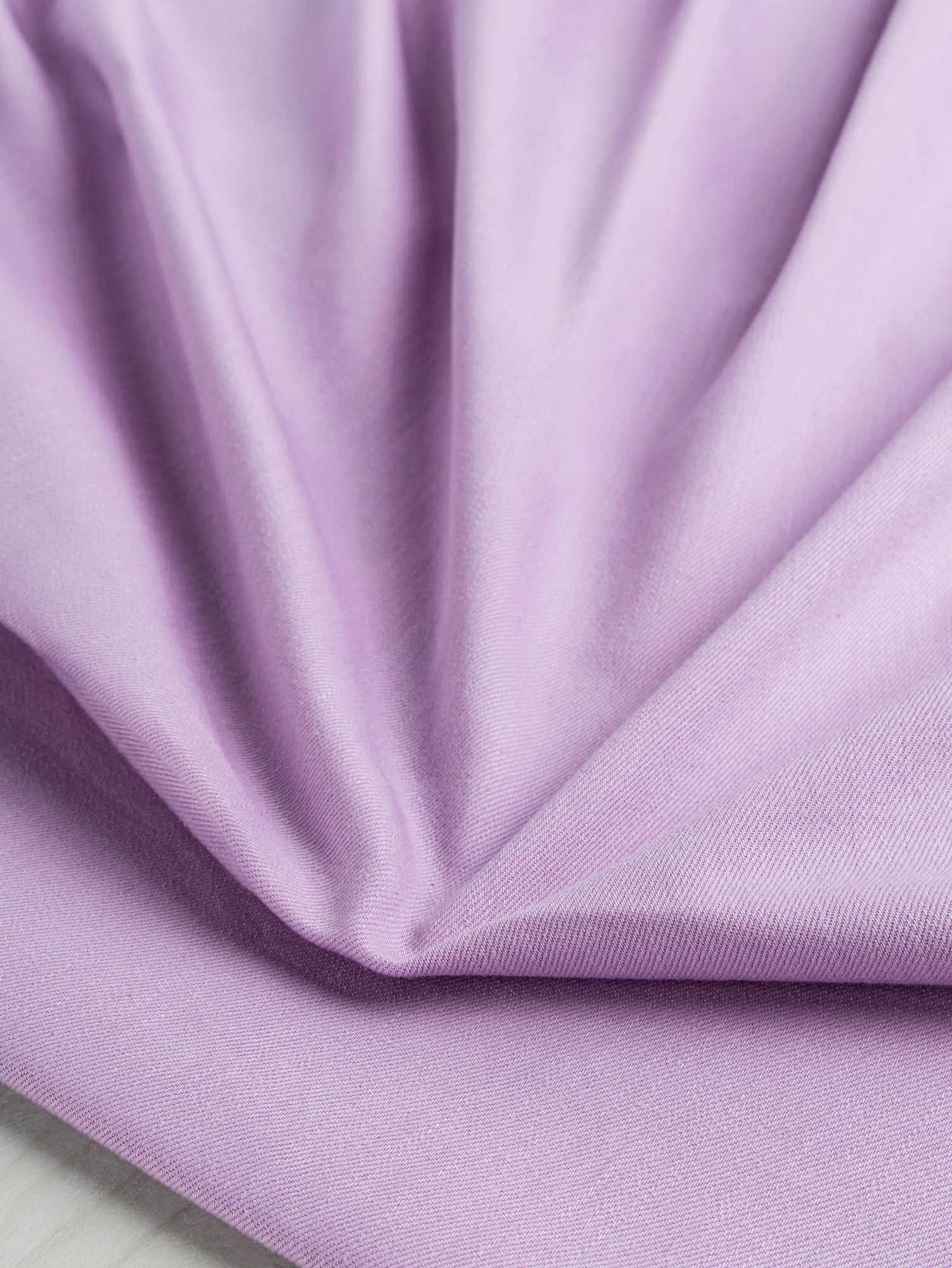 F-DEN022-001-10oz-Organic-Cotton-Stretch-Bull-Denim-Lavender-Core-Fabrics-scrunched.JPG