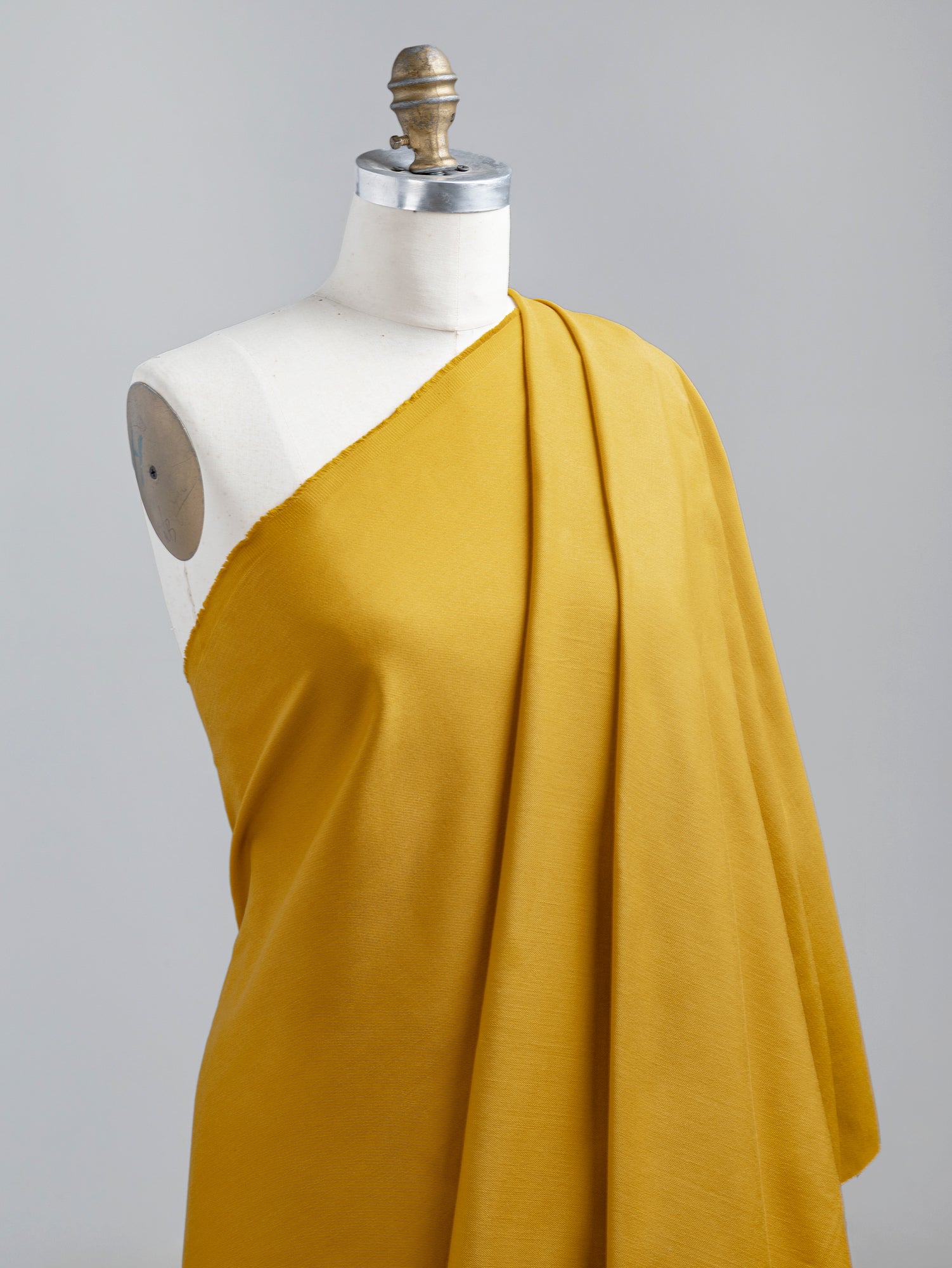 F-DEN022-008-10oz-Organic-Cotton-Stretch-Bull-Denim-Marigold-Core-Fabrics-draped.JPG