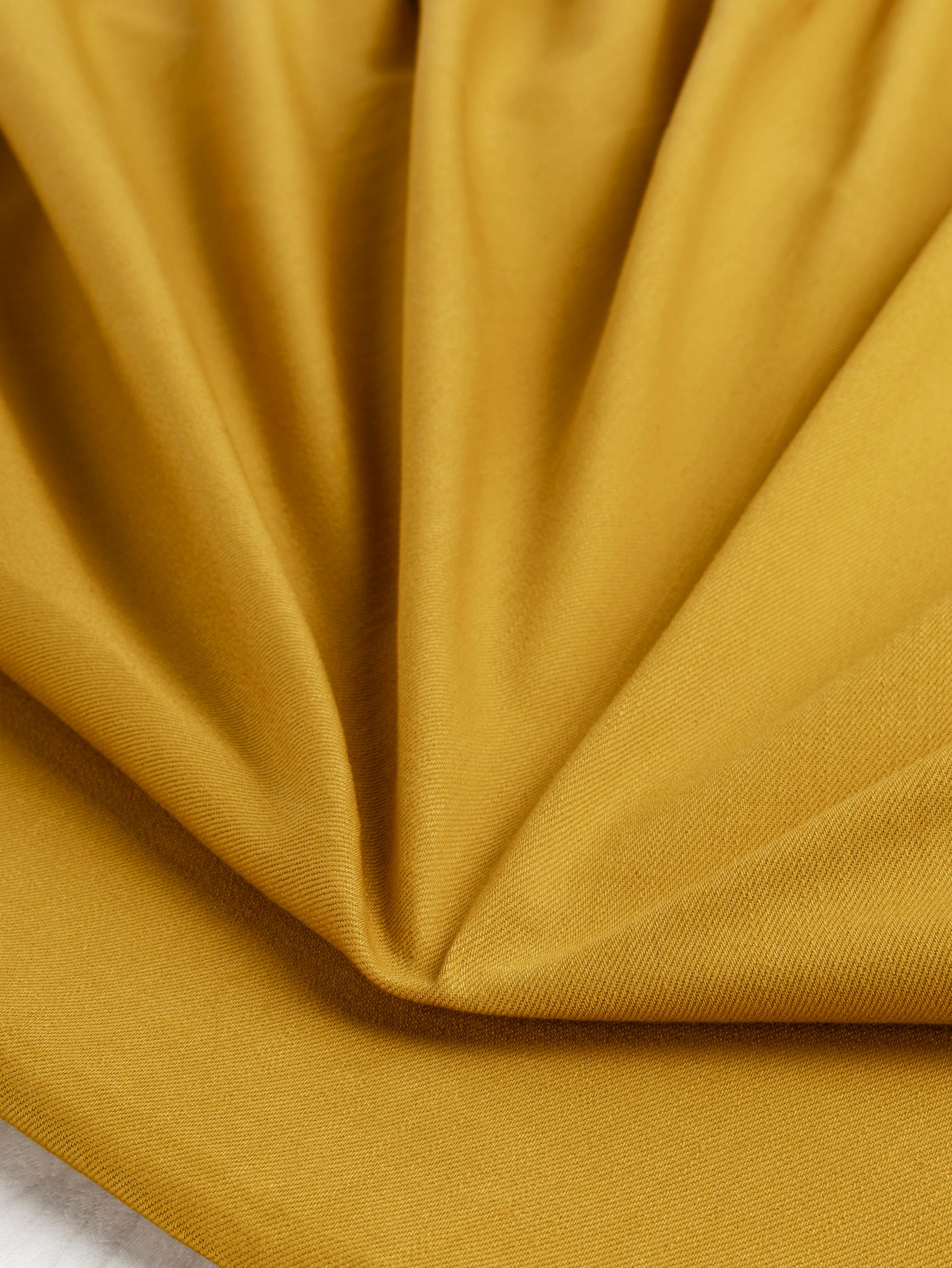 F-DEN022-008-10oz-Organic-Cotton-Stretch-Bull-Denim-Marigold-Core-Fabrics-scrunched.JPG
