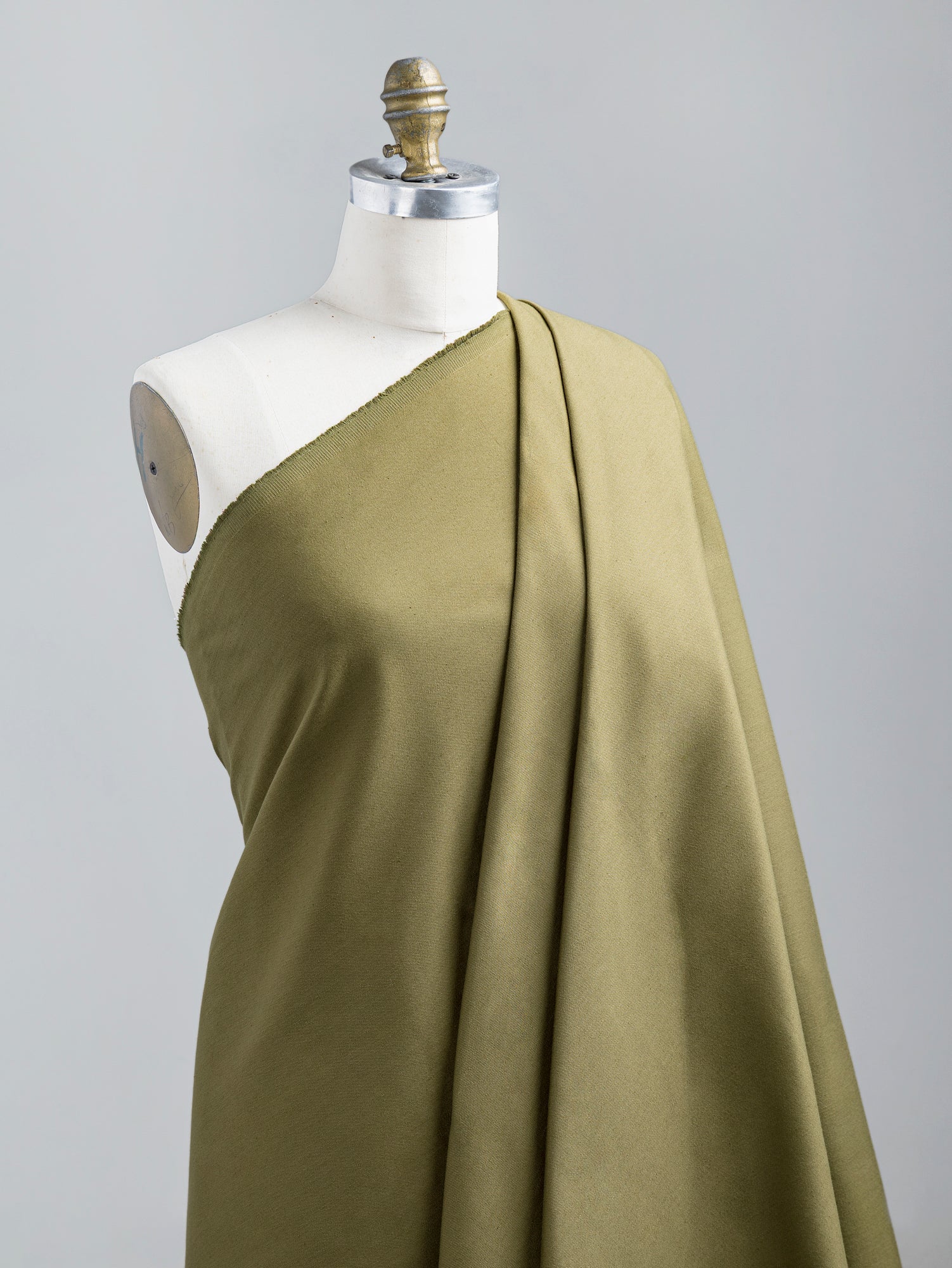 F-DEN022-007-10oz-Organic-Cotton-Stretch-Bull-Denim-Olive-Core-Fabrics-draped.JPG