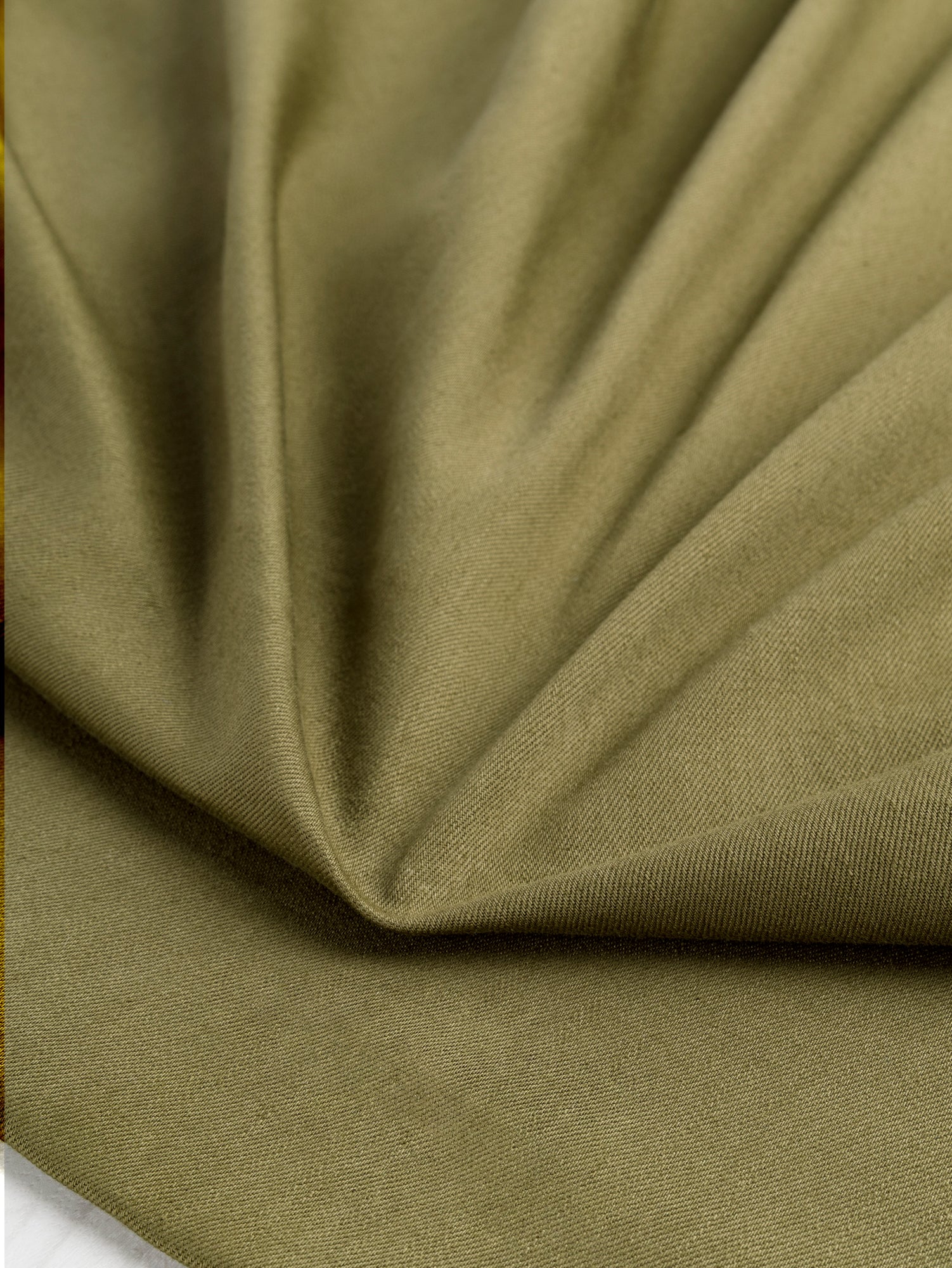 F-DEN022-007-10oz-Organic-Cotton-Stretch-Bull-Denim-Olive-Core-Fabrics-scrunched.JPG