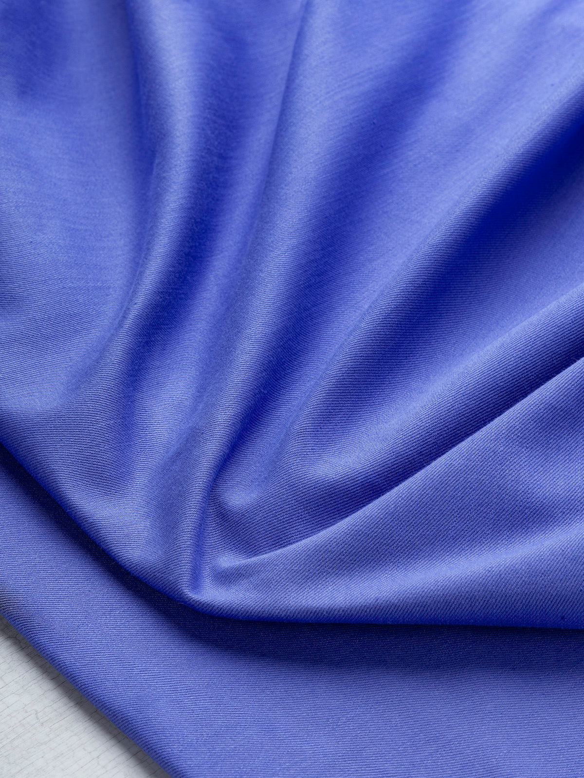 F-DEN022-012-10oz-Organic-Cotton-Stretch-Bull-Denim-Periwinkle-Core-Fabrics-scrunched.webp