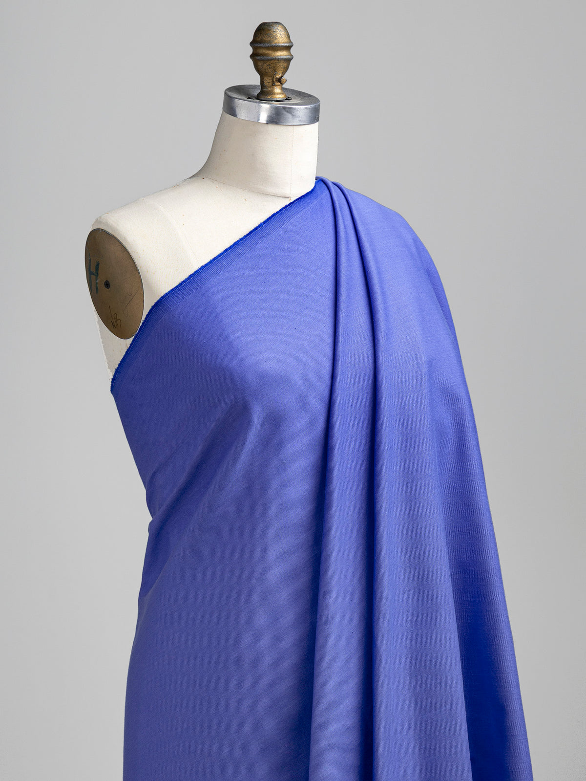 F-DEN022-012-10oz-Organic-Cotton-Stretch-Bull-Denim-Periwinkle-Core-Fabrics-draped.webp