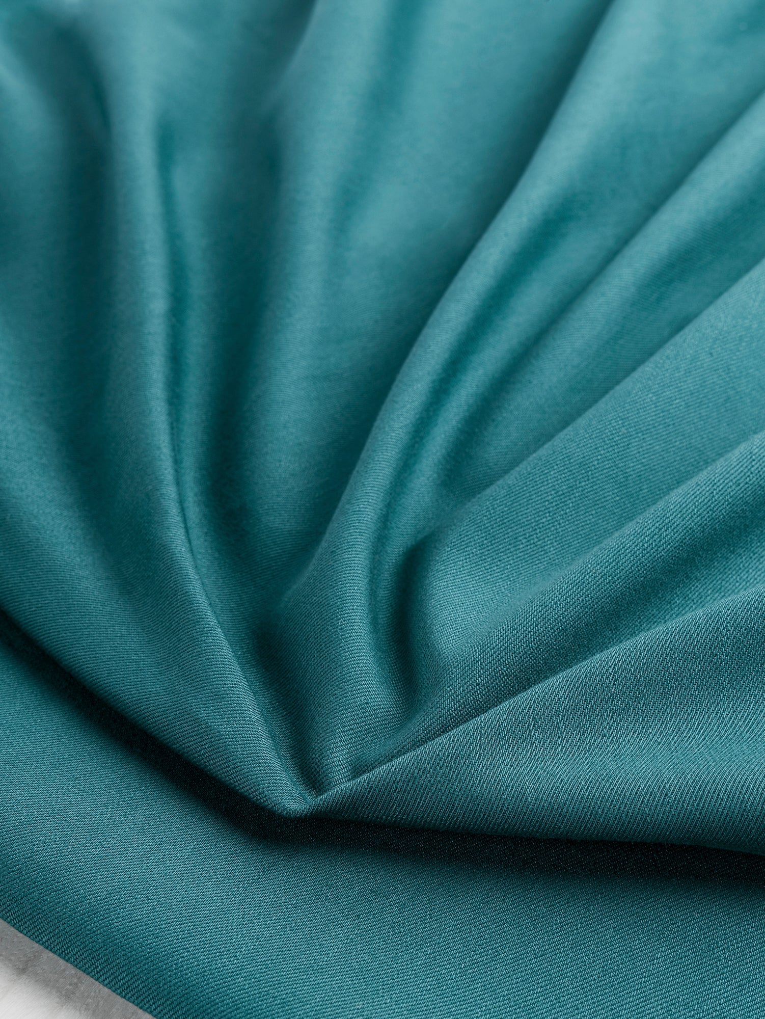 F-DEN022-006-10oz-Organic-Cotton-Stretch-Bull-Denim-Teal-Core-Fabrics-scrunched.JPG