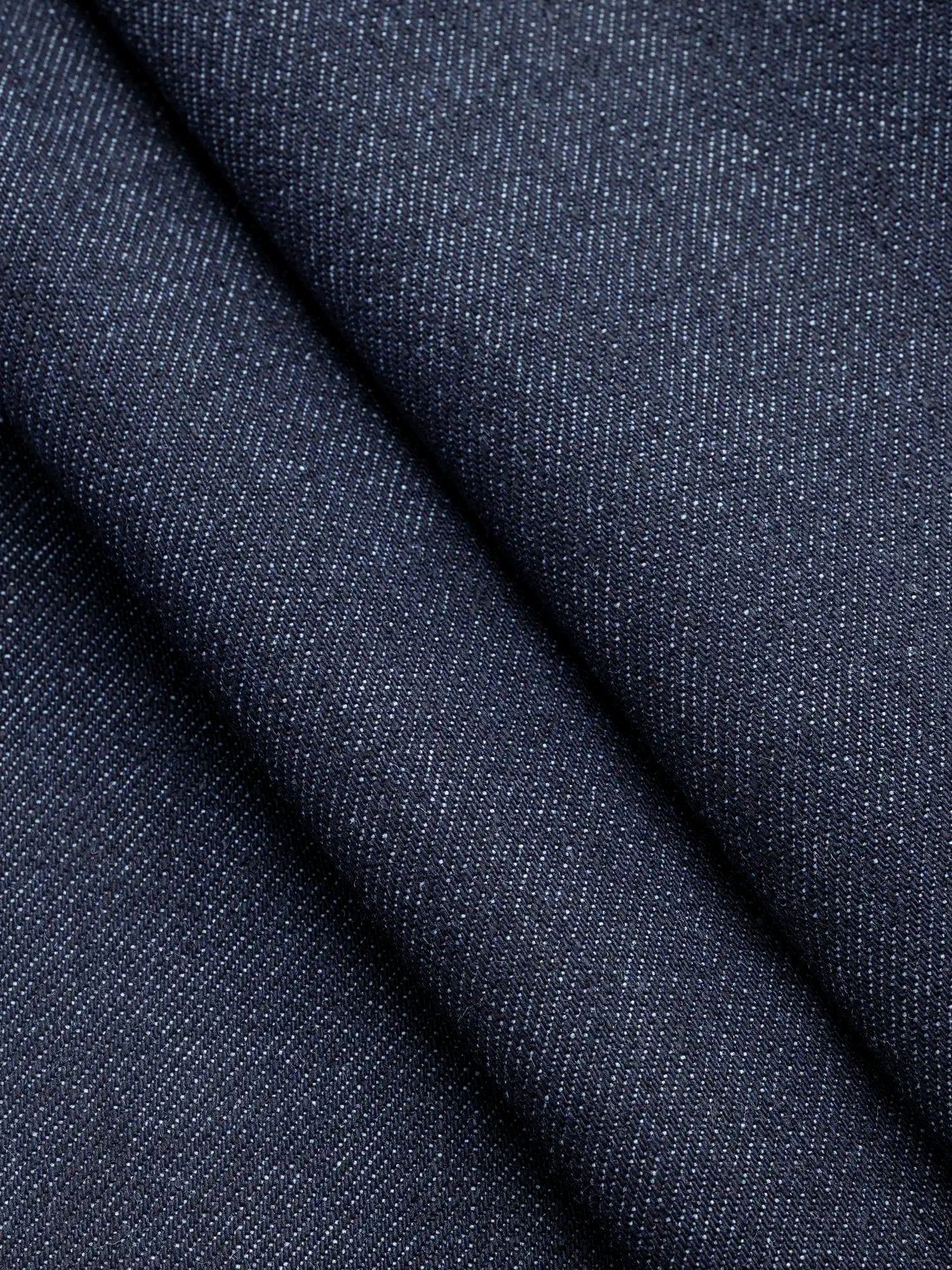 F-DEN041-11.85oz-Non-Stretch-Cotton-Tencel-Cone-Denim-Indigo-Core-Fabrics-fold.webp