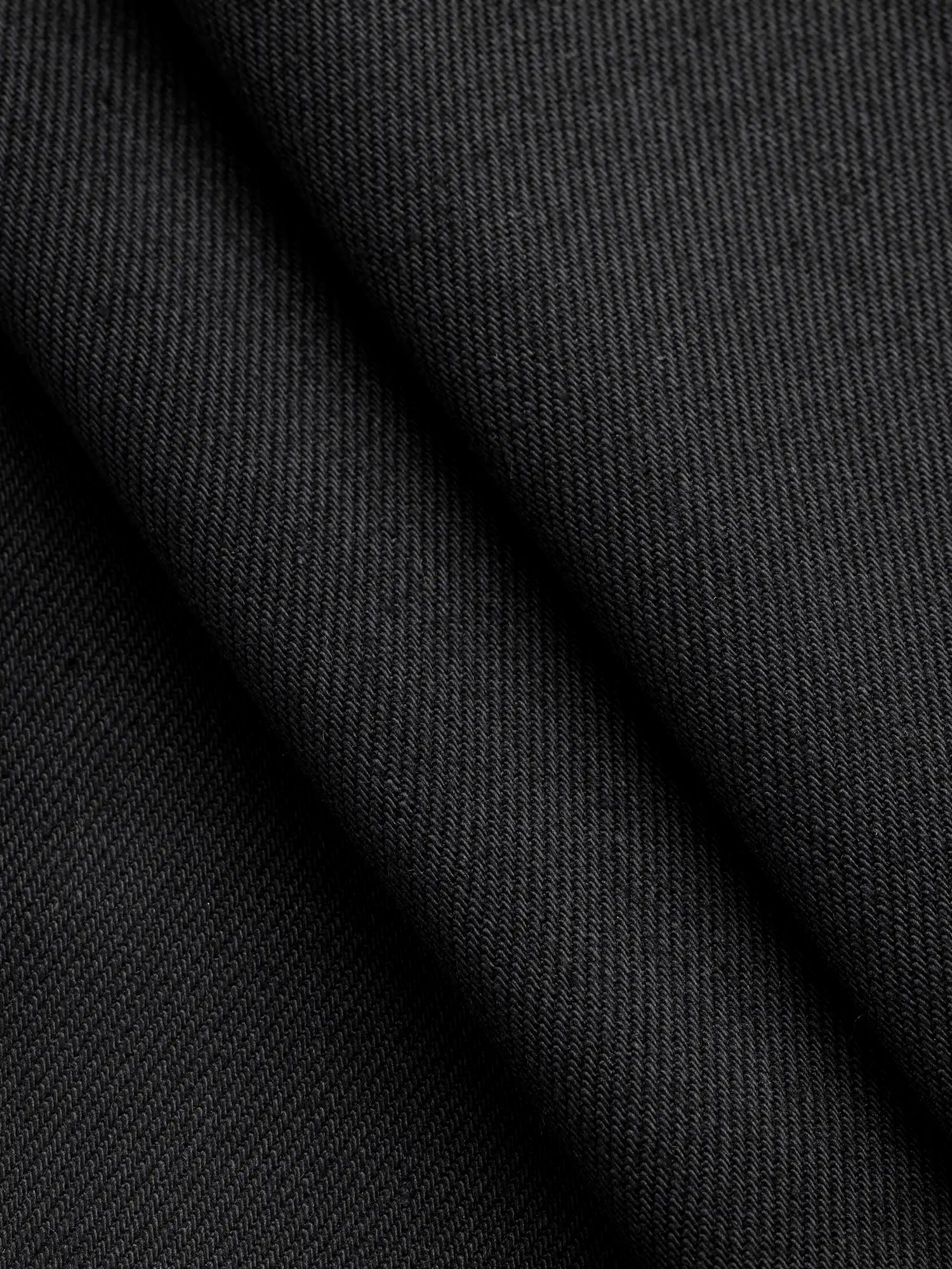 F-DEN039-12oz-Non-Stretch-Cotton-Tencel-Cone-Denim-Black-Core-Fabrics-fold.webp