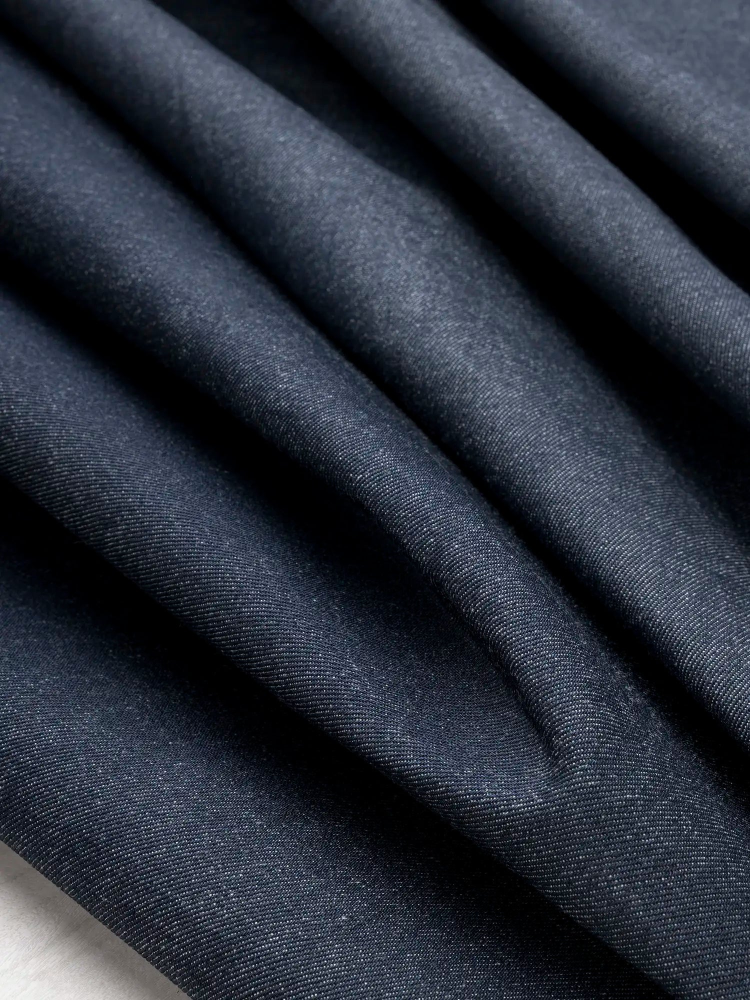F-DEN040-14oz-Non-Stretch-Cotton-Cone-Denim-Deep-Indigo-Core-Fabrics-scrunched.webp