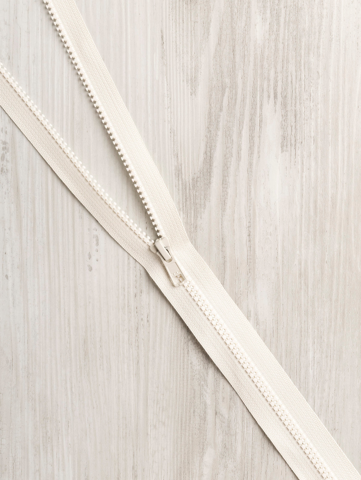 N-ZIP014-30-inch-Open-End-YKK-Separating-Zipper-with-Vislon-Teeth-Cream-Core-Fabrics-.webp