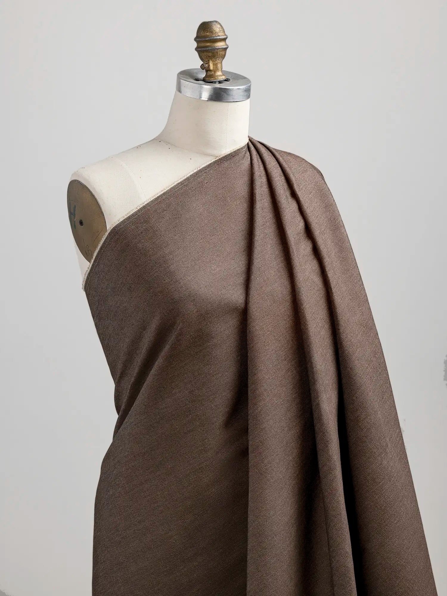 F-COT454-5-oz-Recycled-Cotton-Denim-Shirting-Brown-Core-Fabrics-draped.webp