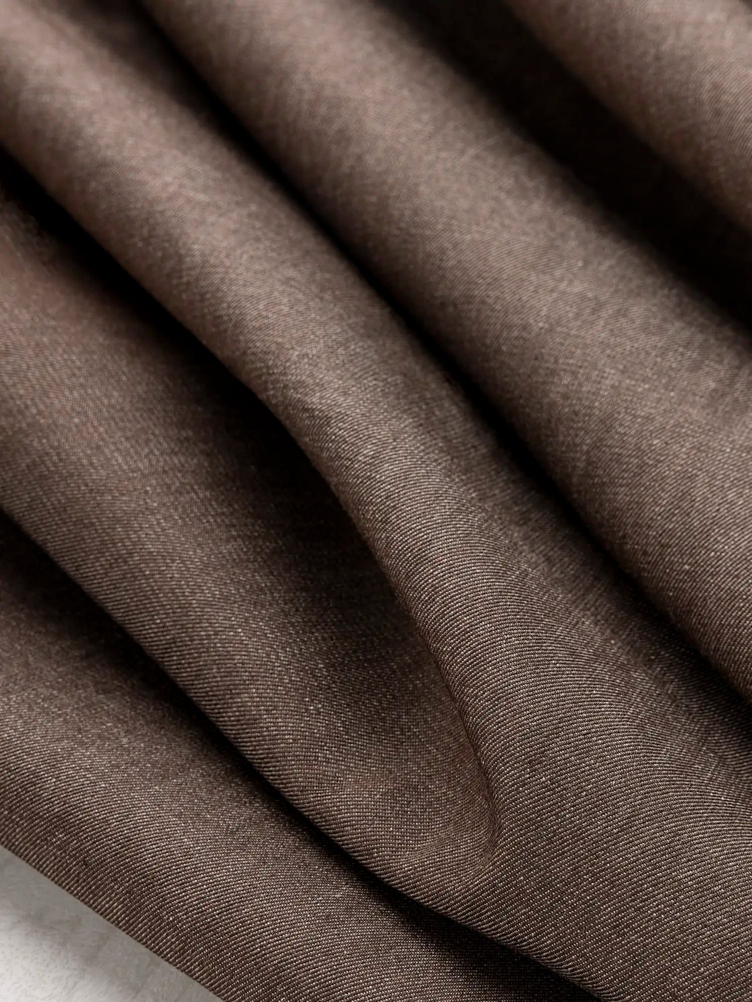 F-COT454-5-oz-Recycled-Cotton-Denim-Shirting-Brown-Core-Fabrics-scrunched.webp