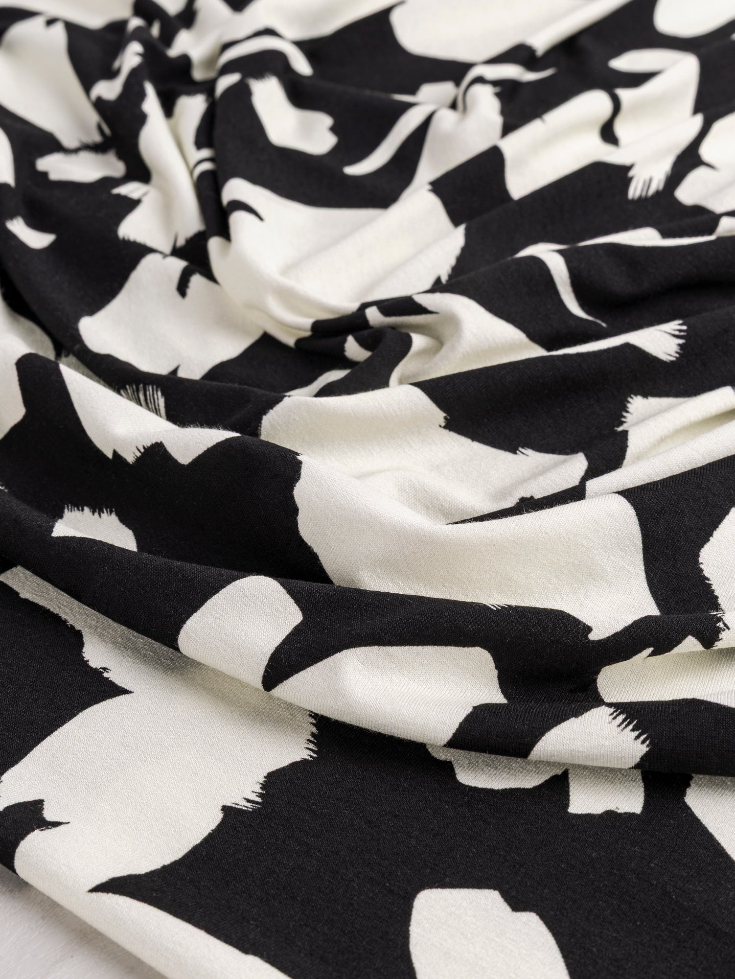 F-VIS269-Abstract-Brushstroke-Viscose-Knit-Black-Cream-Core-Fabrics-scrunched-2.JPG