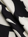 F-VIS269-Abstract-Brushstroke-Viscose-Knit-Black-Cream-Core-Fabrics-fold.JPG