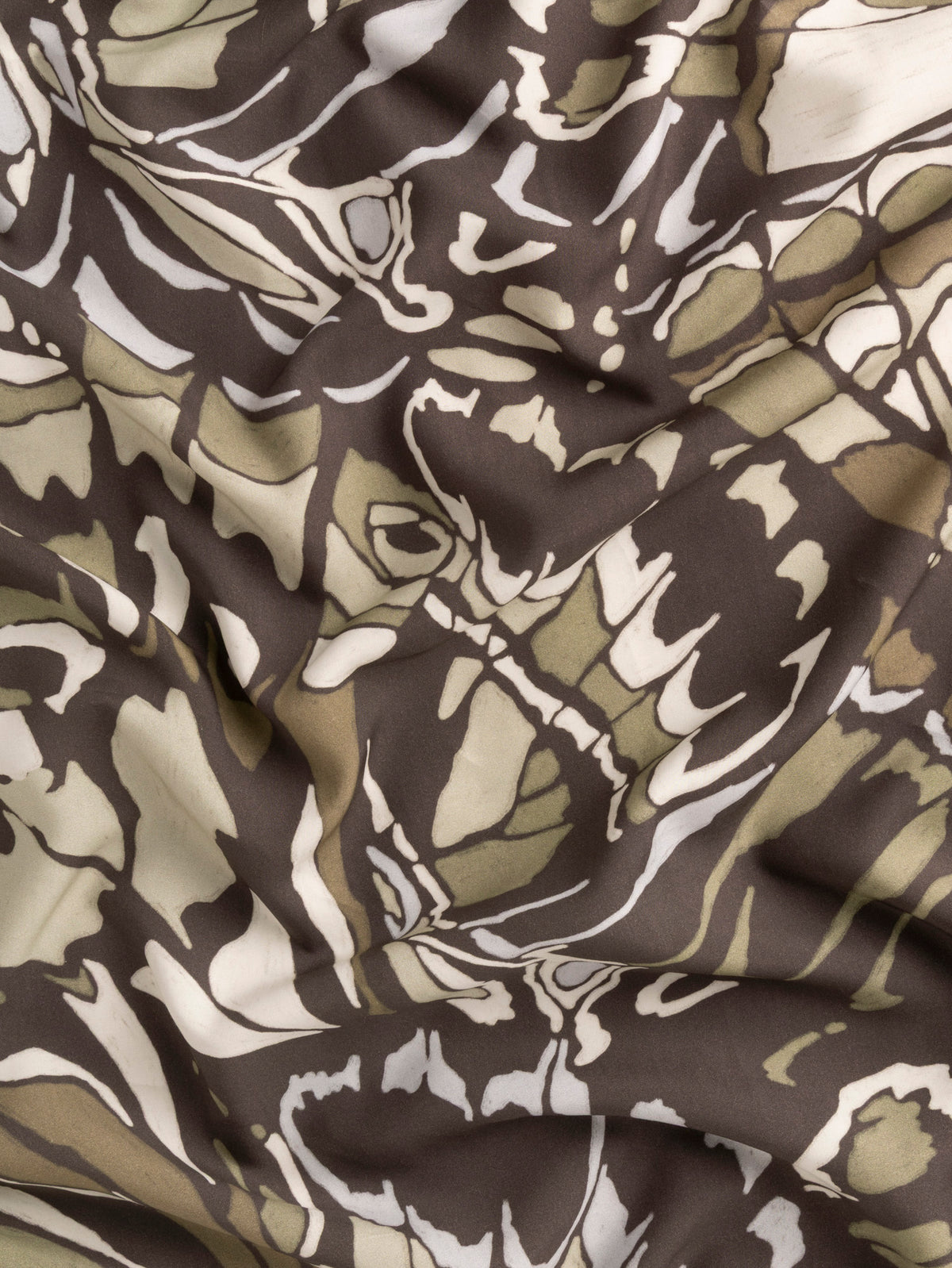 F-TEN021-Abstract-Butterfly-Print-Lyocell-Charcoal-Khaki-and-Pearl-Core-Fabrics-scrunched.webp