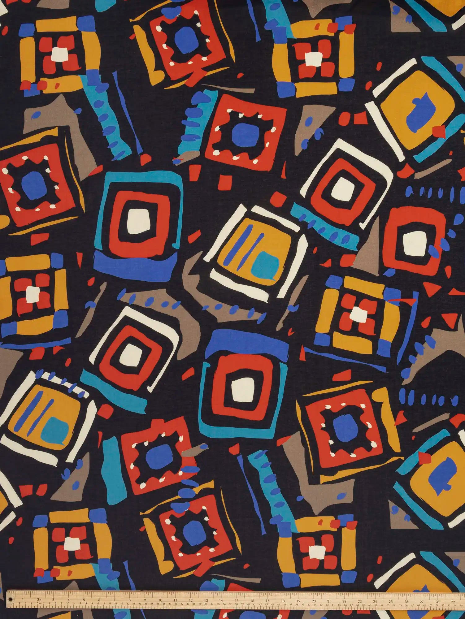 F-COT446-Abstract-Geo-Print-BCI-Cotton-Voile-Black-and-Multicolour-Core-Fabrics-ruler.webp