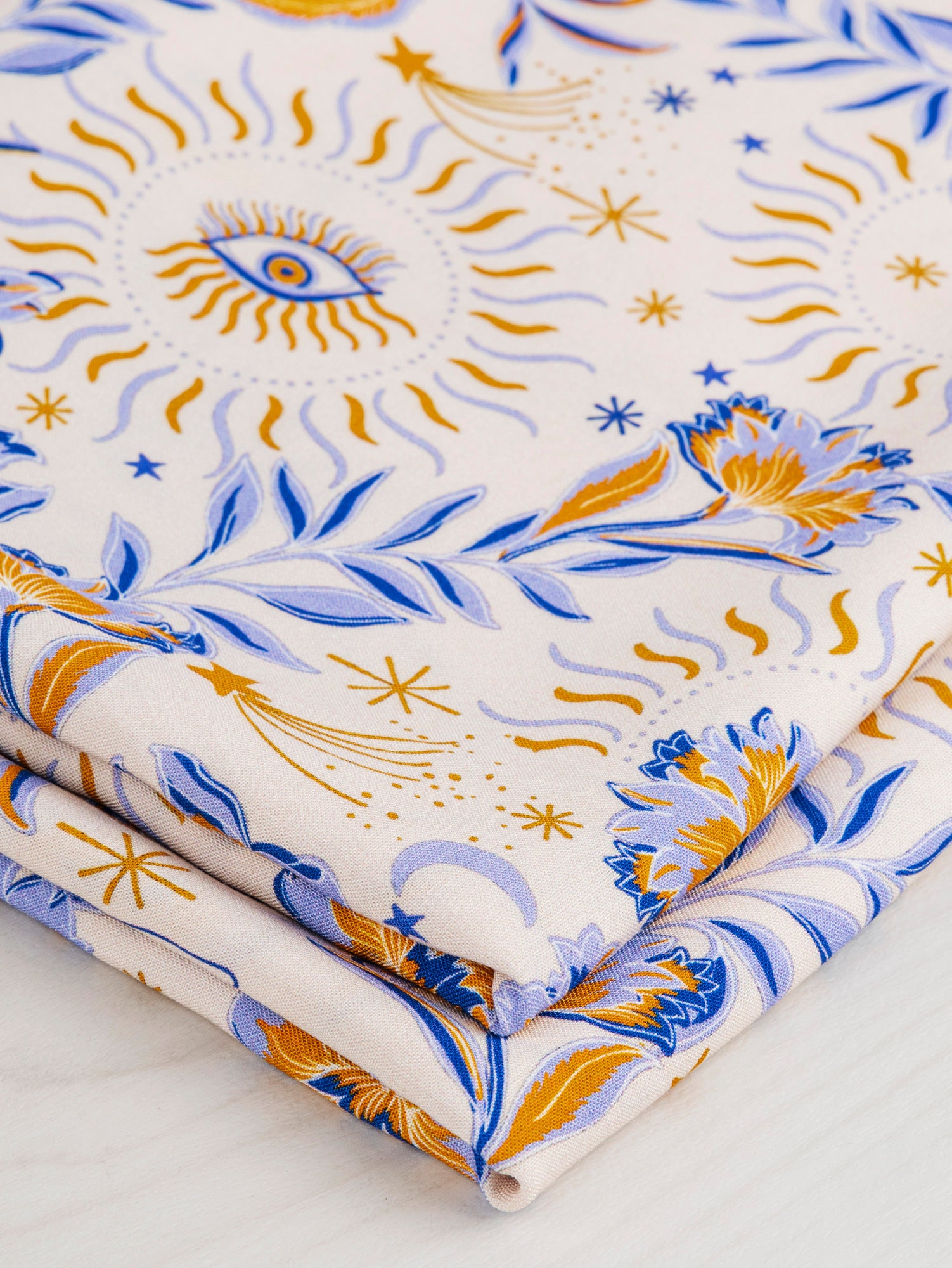 F-VIS231-Amulet-Print-Ecovero-Viscose-Cream-Periwinkle-Ochre-Core-Fabrics-fold