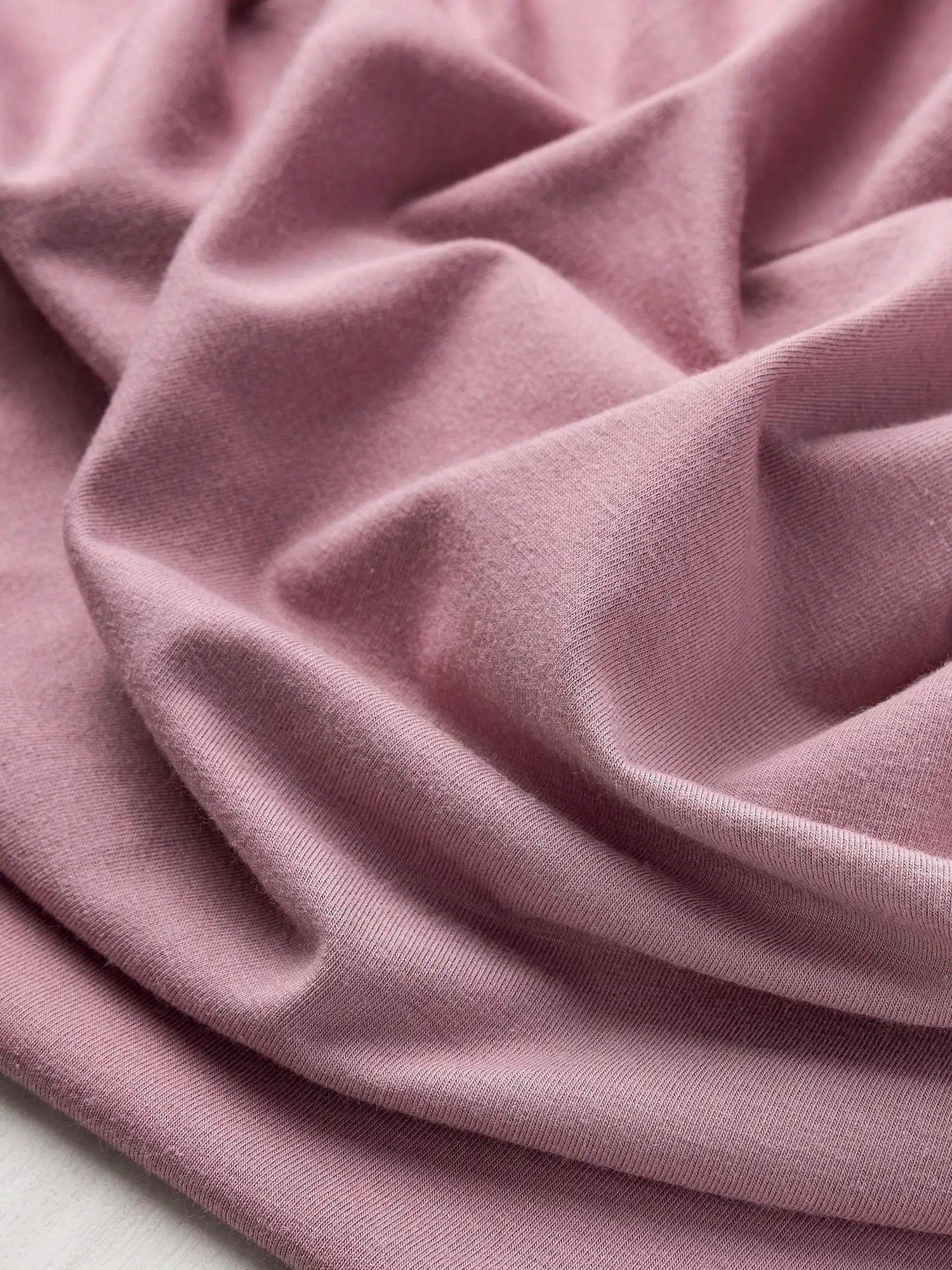 F-BAM006-006-Bamboo-Organic-Cotton-Spandex-Jersey-Knit-Lilac-Core-Fabrics-scrunched.webp