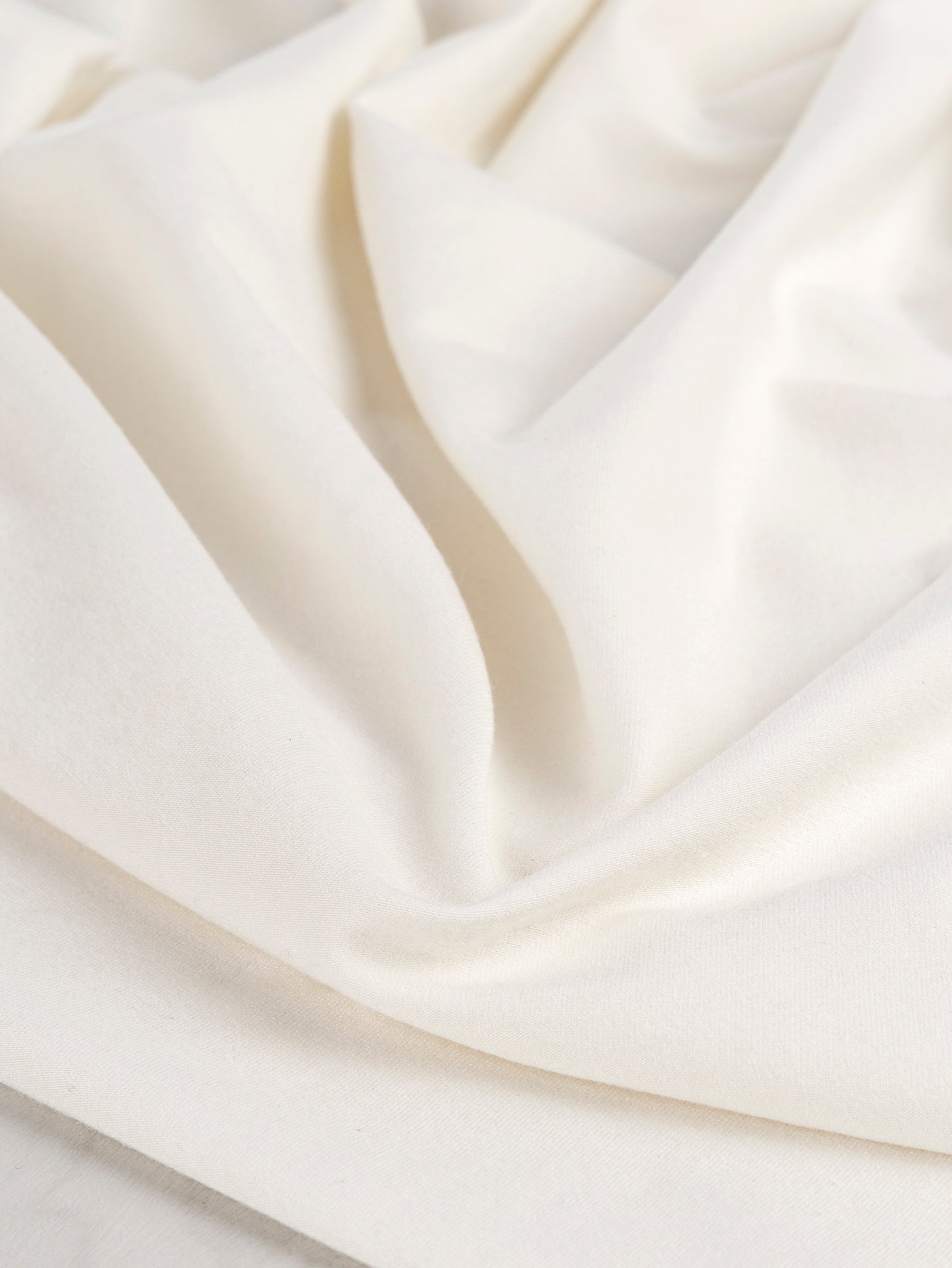 F-BAM006-009-Bamboo-Organic-Cotton-Spandex-Jersey-Knit-Natural-Core-Fabrics-scrunched.JPG