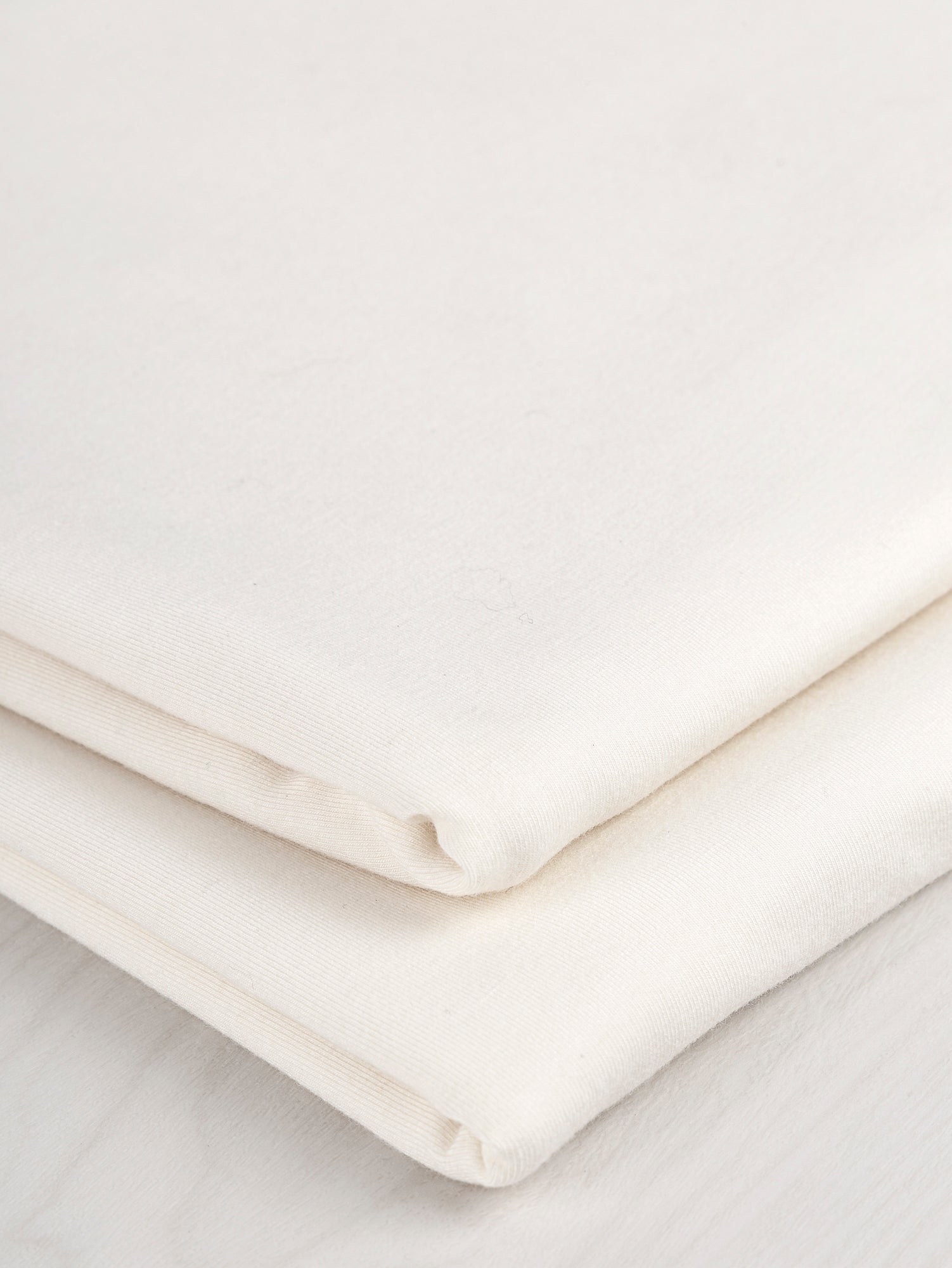 F-BAM006-009-Bamboo-Organic-Cotton-Spandex-Jersey-Knit-Natural-Core-Fabrics-fold.JPG