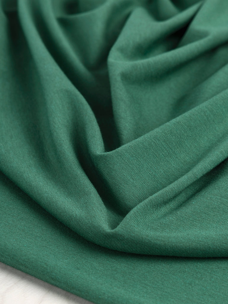 Jersey maille extensible en bambou, coton biologique et élasthanne – Vert pin
