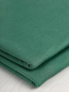 F-BAM006-020-Bamboo-Organic-Cotton-Spandex-Jersey-Knit-Pine-Green-Core-Fabrics-fold.JPG
