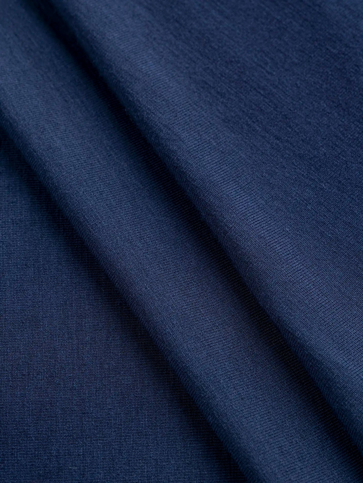 F-DEA206-Bamboo-Spandex-Stretch-Knit-Deadstock-Midnight-Blue-Core-Fabrics-fold.webp