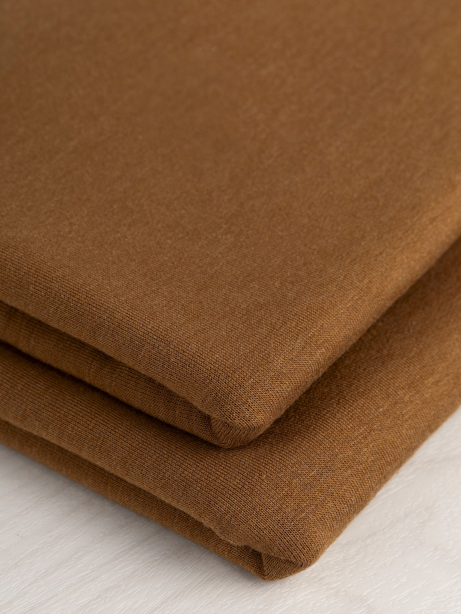 F-DEA068-001-Bamboo-Stretch-French-Terry-Deadstock-Ochre-Core-Fabrics-fold.JPG