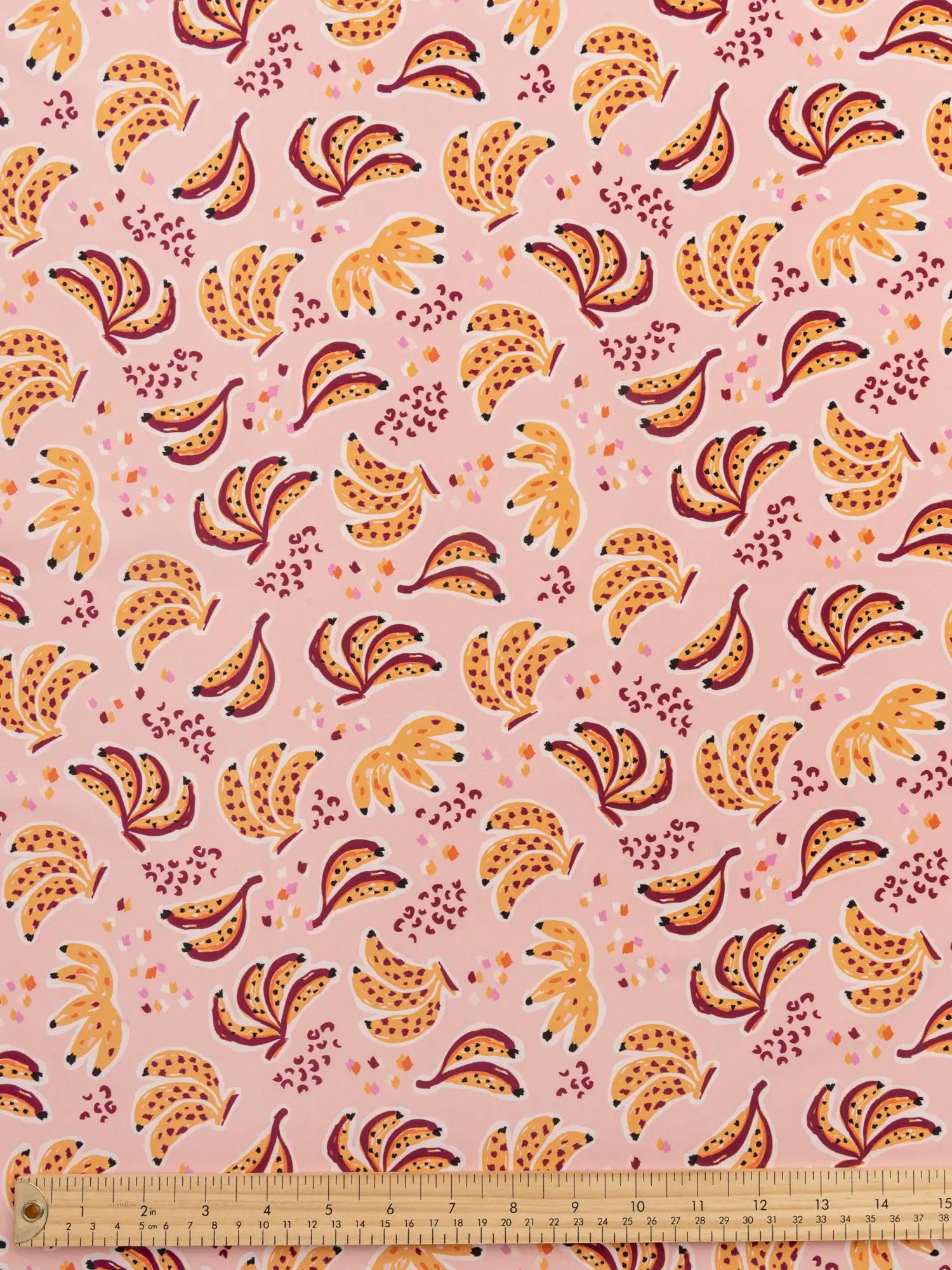 F-NYL021-Banana-Split-Print-Swim-Performance-Knit-Pink-and-Multicolour-Core-Fabrics-ruler.webp
