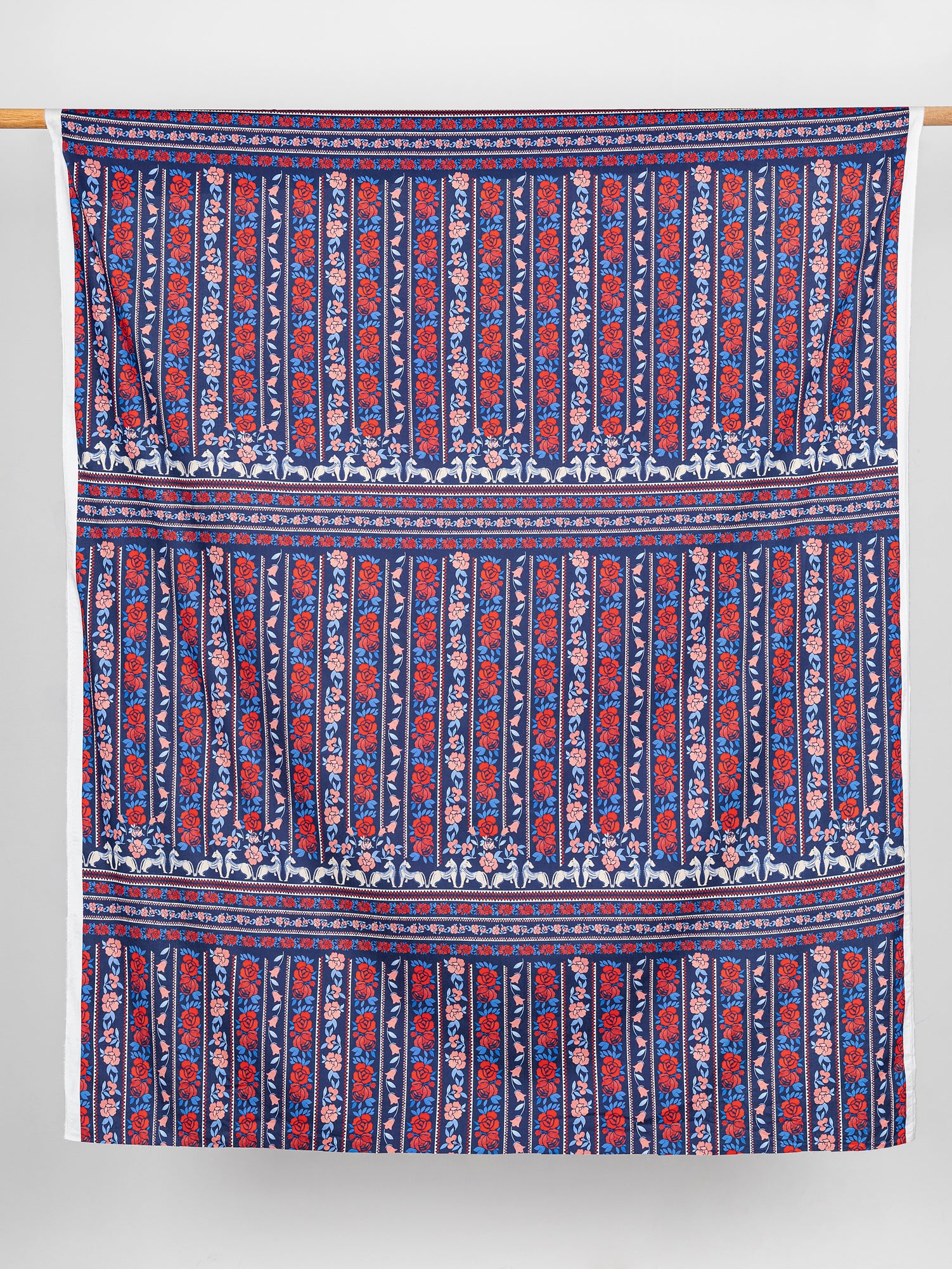 F-COT332-Band-Of-Roses-Panel-Print-Cotton-Lawn-Navy-Red-Core-Fabrics-draped.JPG