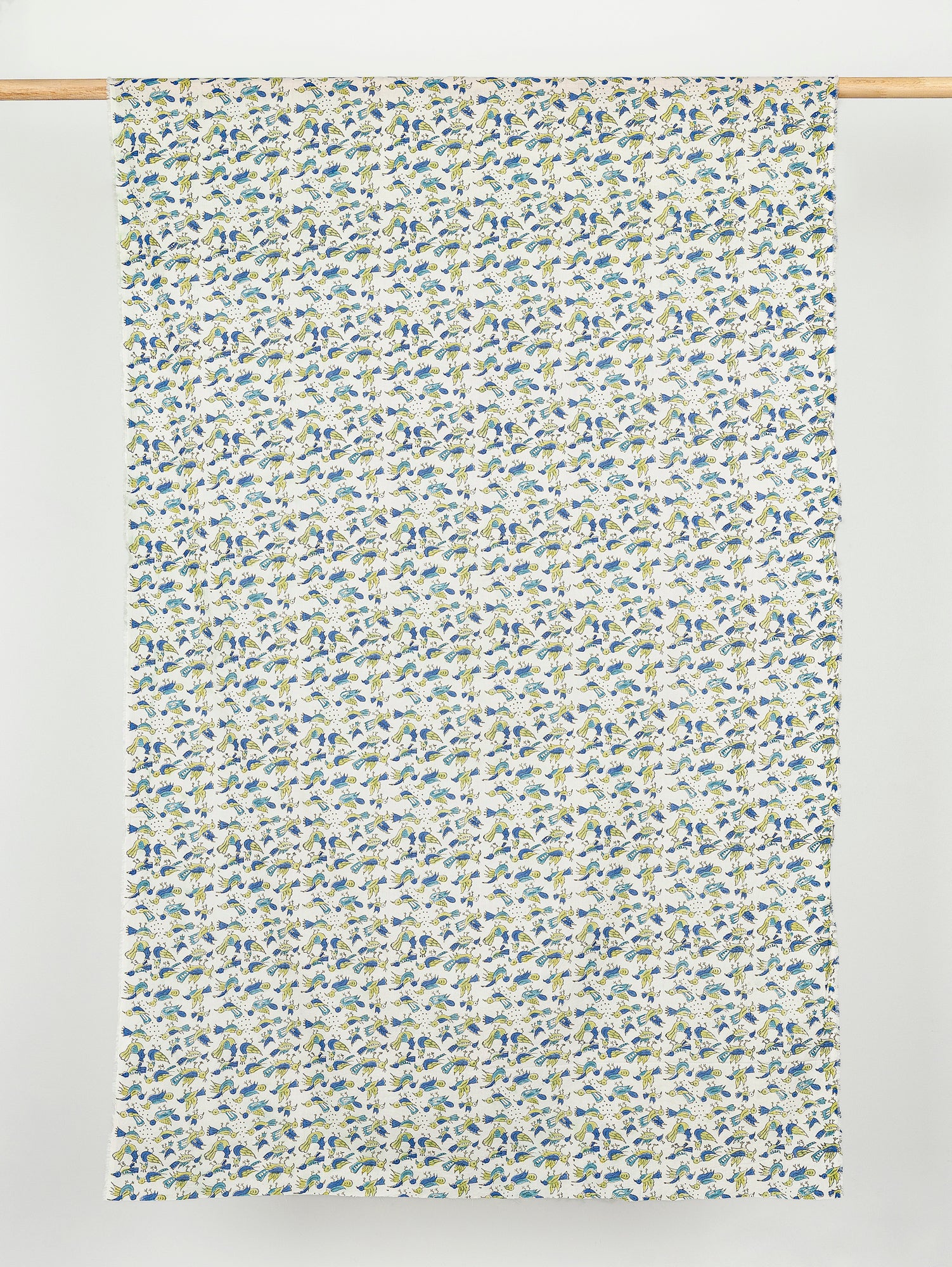 F-COT351-001-Bird-Block-Print-Cotton-Voile-Blue- Green-Off-White-Core-Fabrics-draped.JPG