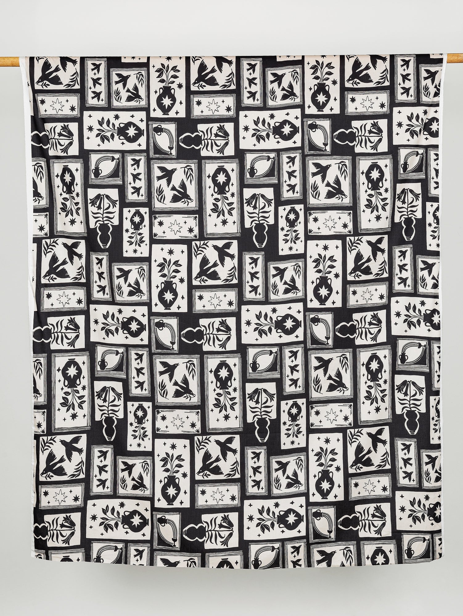 F-COT330-Birds-and-Vases-Gallery-Print-Cotton-Lawn-Black-and-Cream-Core-Fabrics-draped.JPG