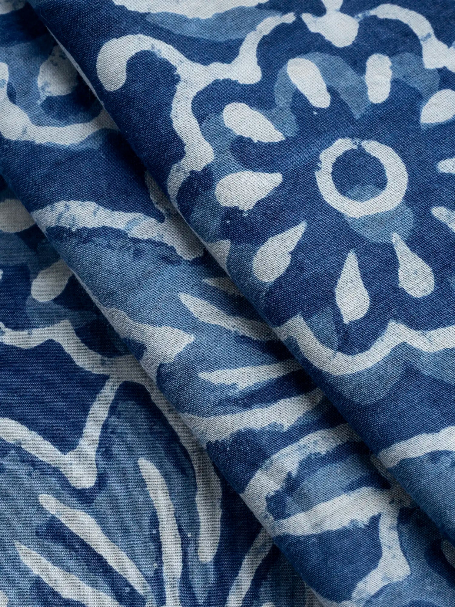 F-COT494-Bloom-Block-Print-Cotton-Poplin-Indigo-and-Chambray-Core-Fabrics-fold.webp