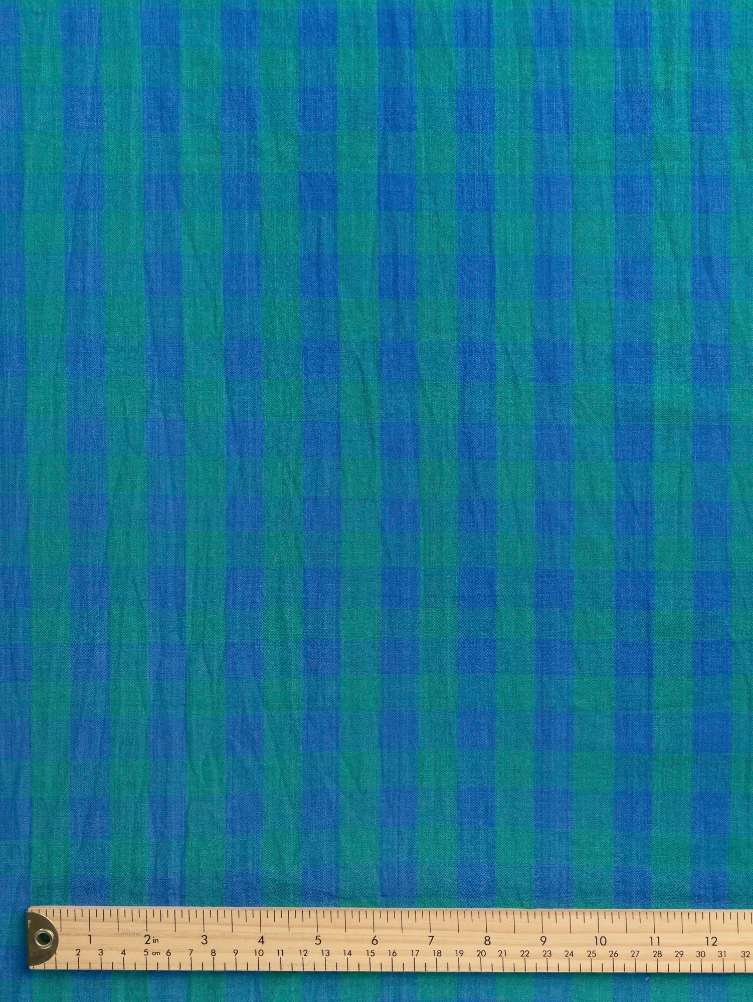 F-COT373-003-Blue-Moon-Handwoven-Gingham-Cotton-Emerald-and-Periwinkle-Core-Fabrics-ruler.webp